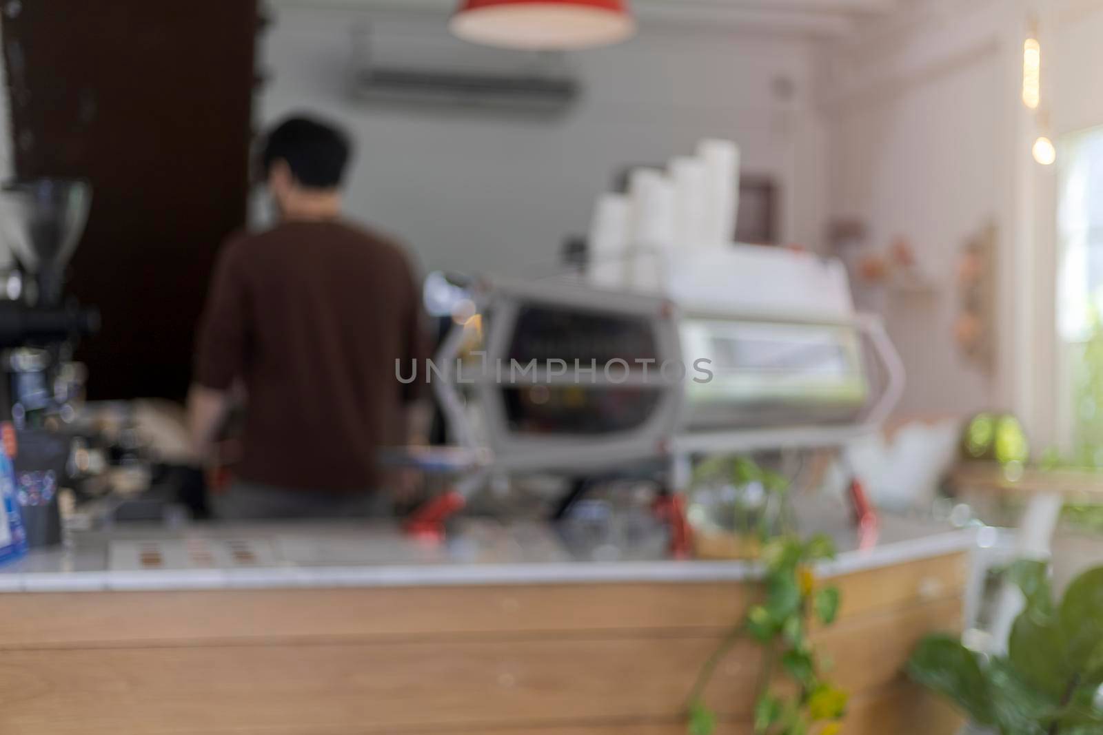 Blur coffee shop or cafe restaurant with abstract light image background. For montage product display or design. Blur coffee shop process in vintage style 