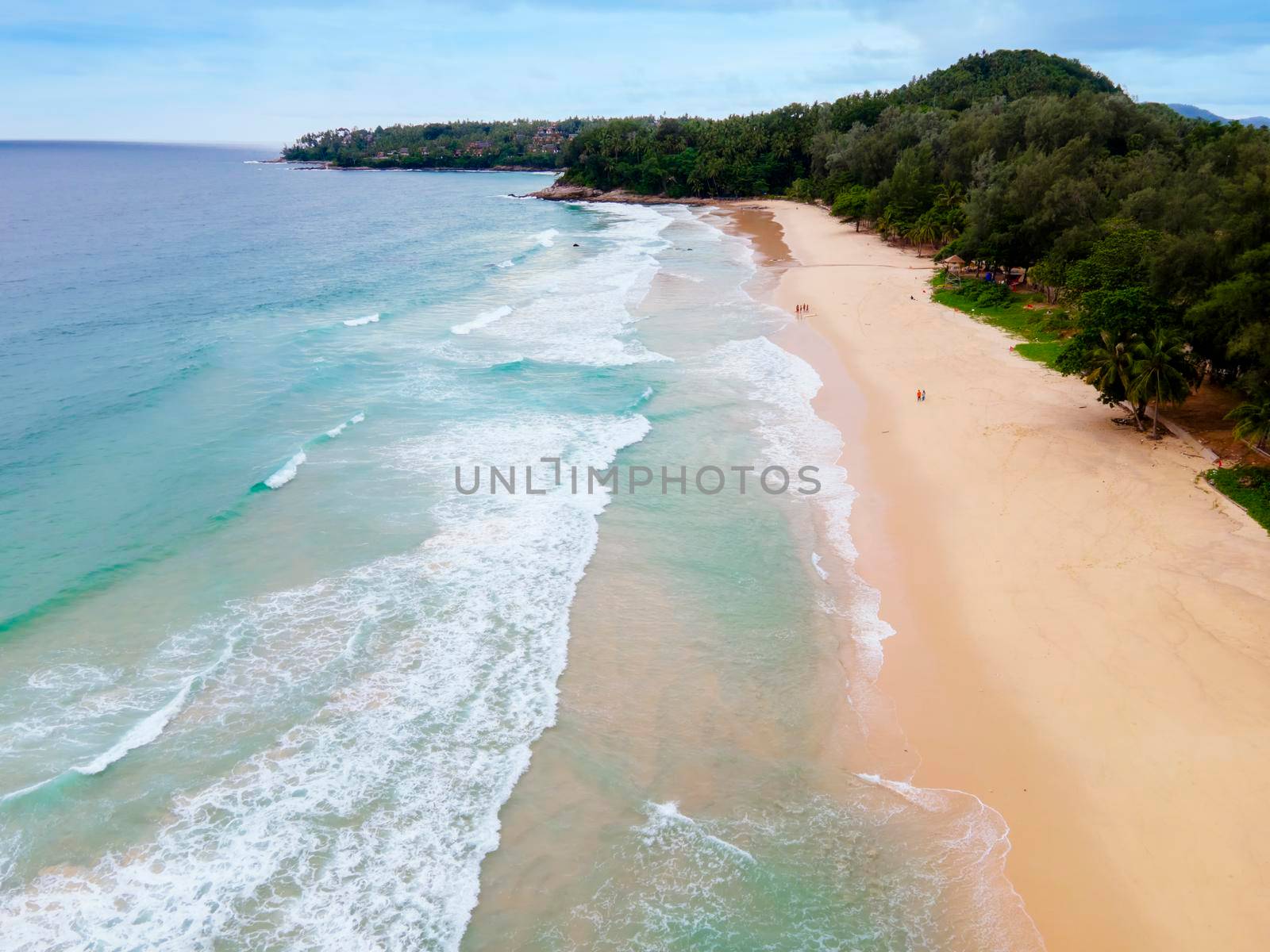 top view drone Beautiful topical beach with white sand. Top view empty and clean beach. Beautiful Phuket beach is famous tourist destination at Andaman sea.