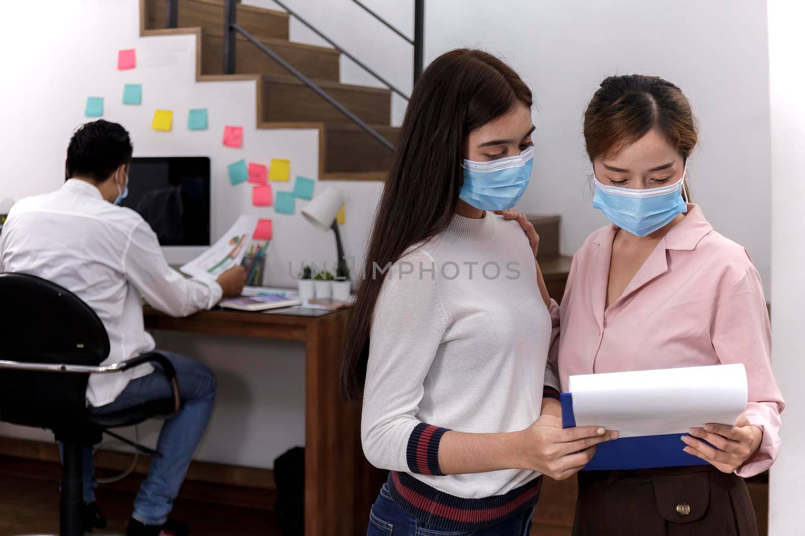 Business Team brainstorm meeting. Group of business people working at Private Home Office.Young business people working with laptop .Asian teamwork business people share idea with team at office