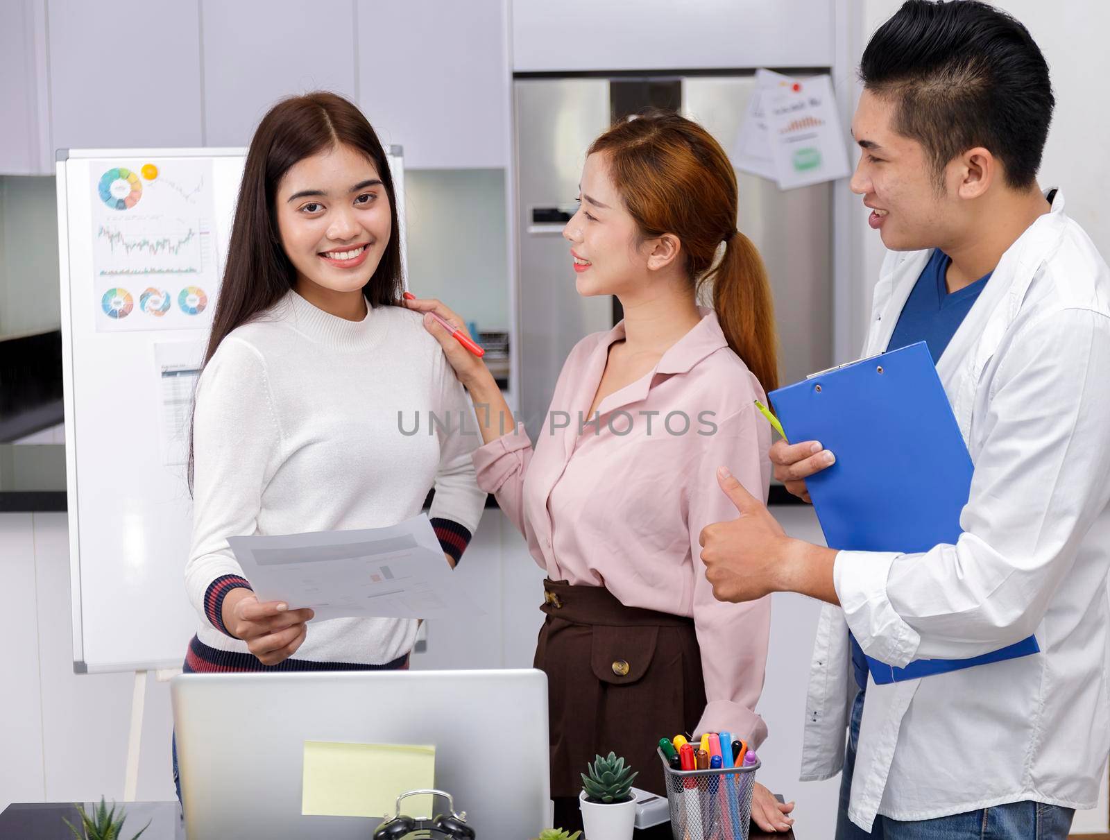 Business Team brainstorm meeting. Group of business people working at Private Home Office.Young business people working with laptop .Asian teamwork business people successful celebrate