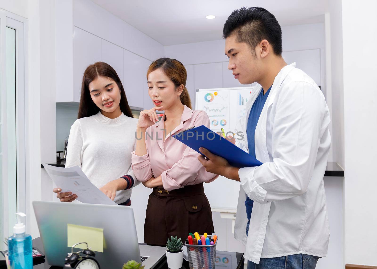 Business Team brainstorm meeting. Group of business people working at Private Home Office.Young business people working with laptop .Asian teamwork business people share idea with team at office