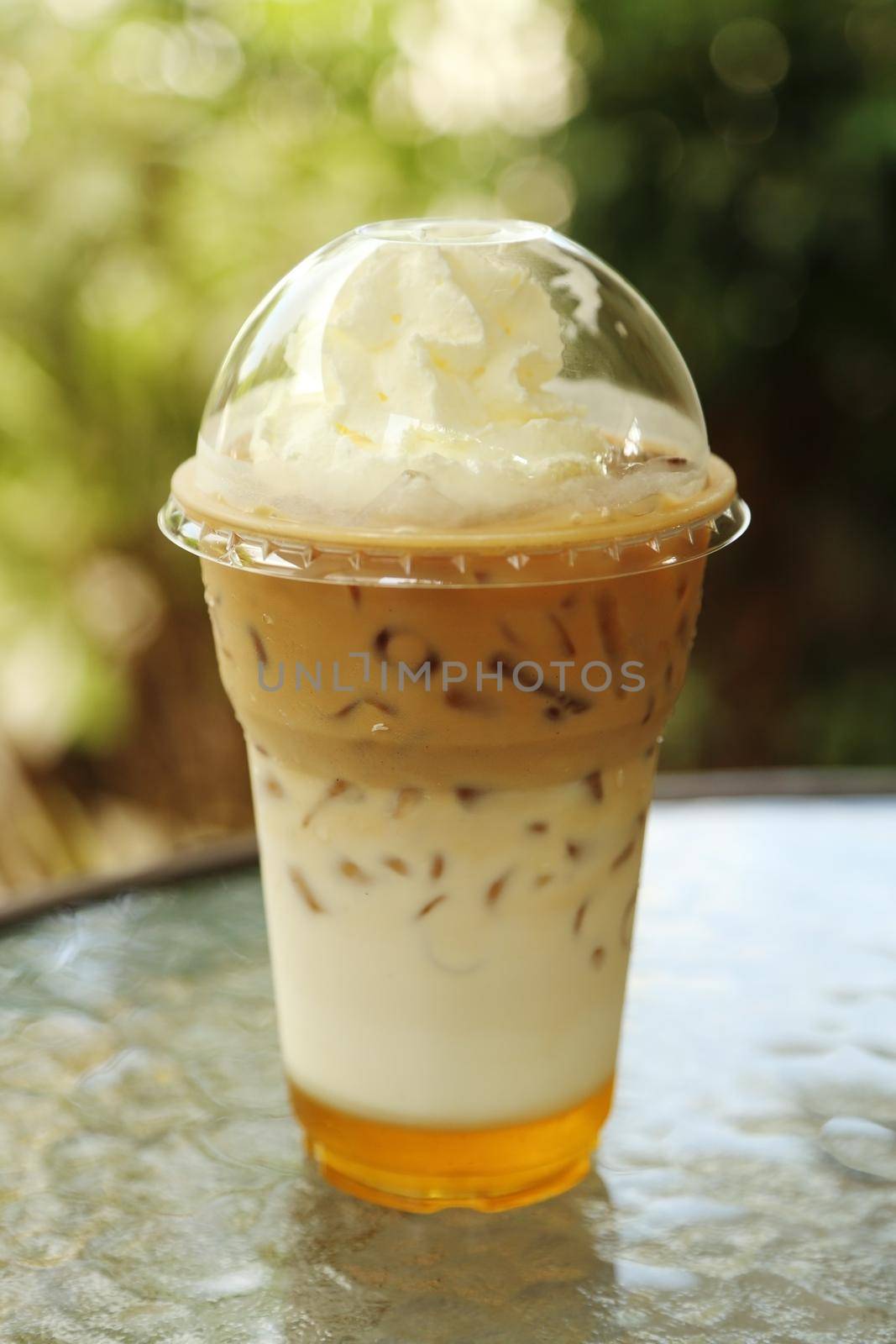 ice coffee with whipping cream by geargodz