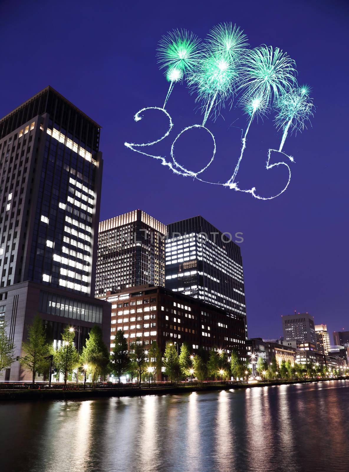 2015 New Year Fireworks celebrating over Tokyo cityscape at night, Japan