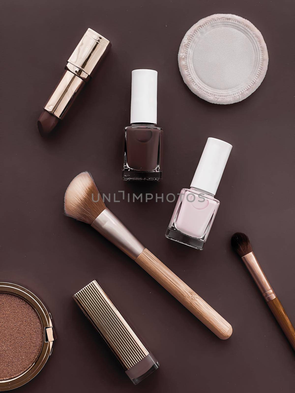 Beauty, make-up and cosmetics flatlay design with copyspace, cosmetic products and makeup tools on brown background, girly and feminine style by Anneleven