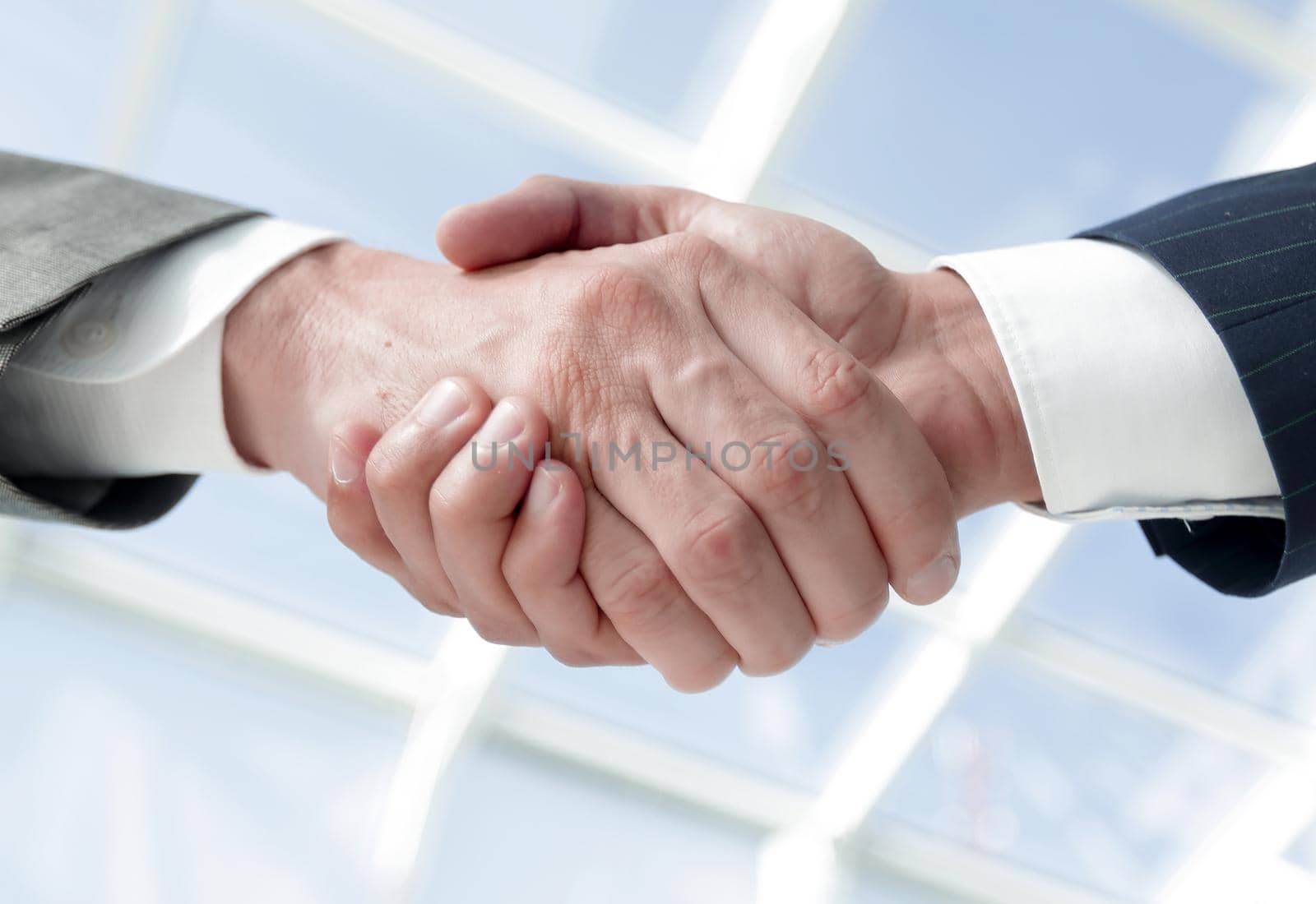 Diverse business male shaking hands. Isolated on white.
