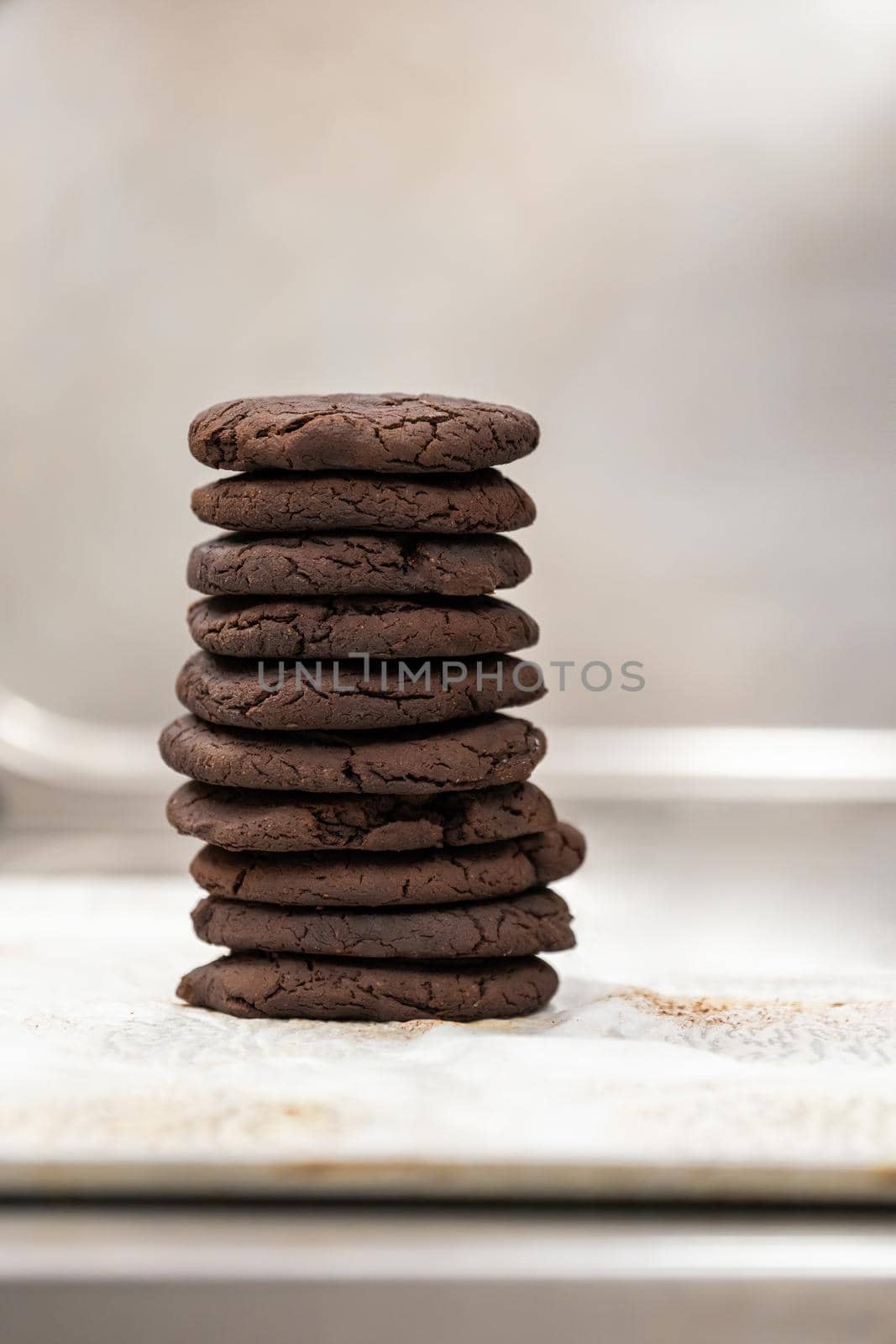 Stack of fresh chocolate cookies with copy space. Brownie homemade chips