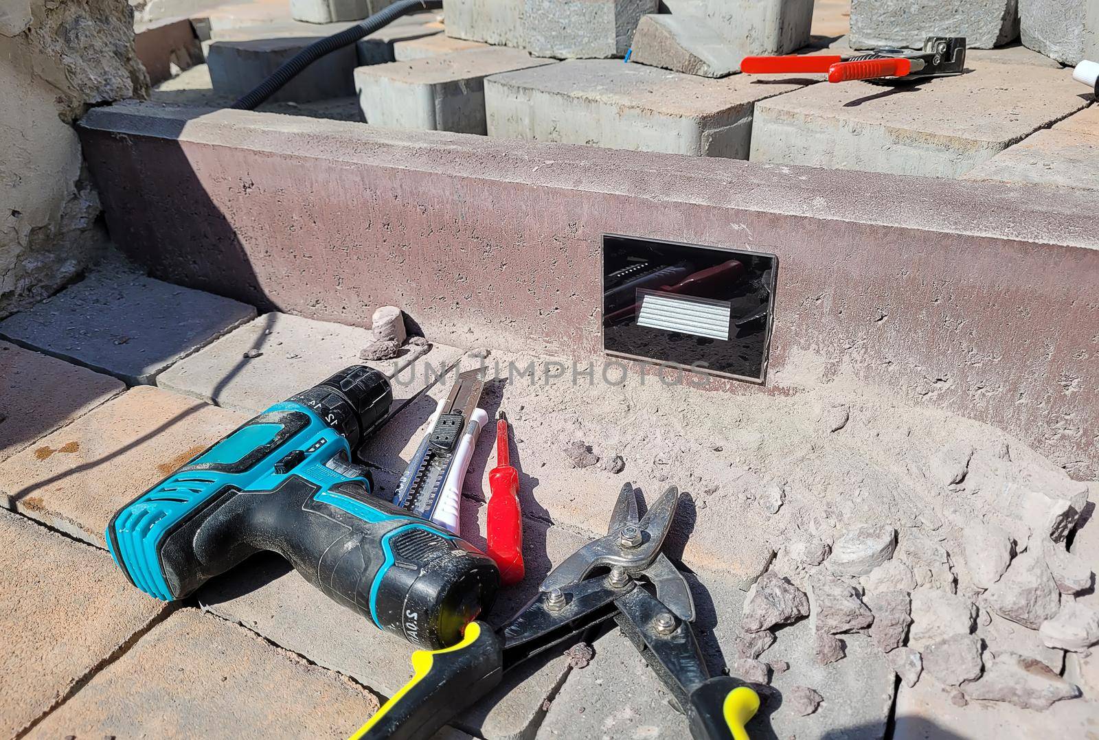 installation of the lamp in a concrete curb. Selective focus