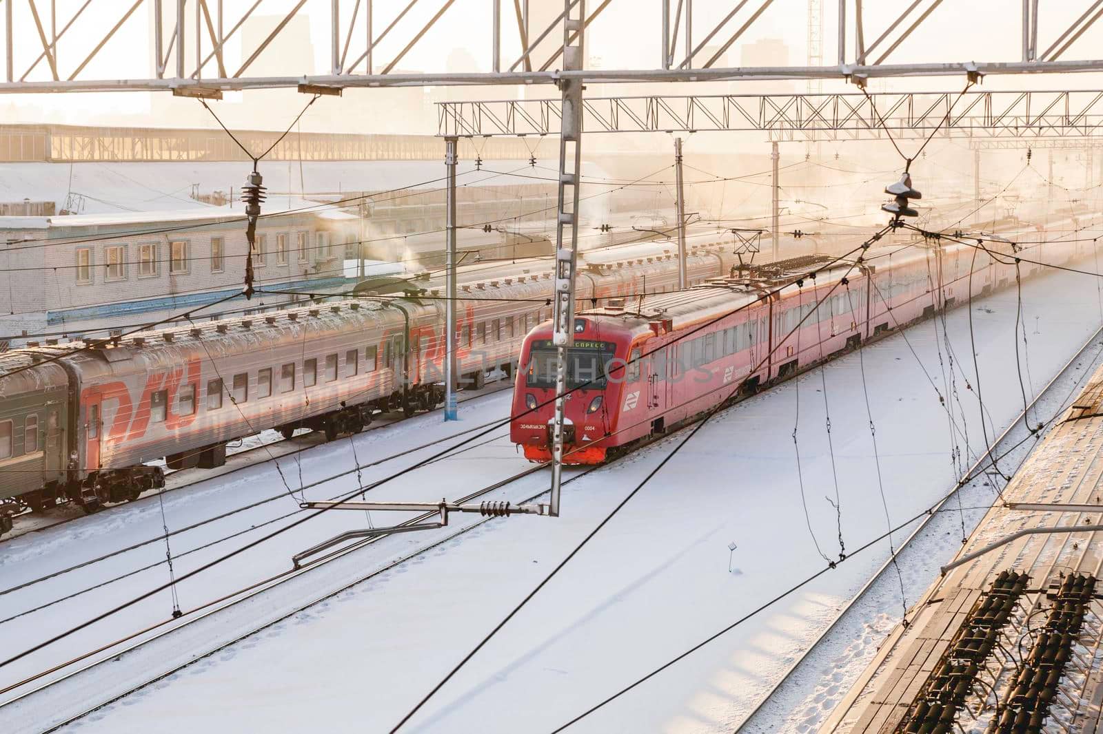 MOSCOW, RUSSIA - January 01, 2010. Upper view on Aeroexpress moving to Vnukovo airport past Studencheskaya subway station of Moscow underground before renovation.