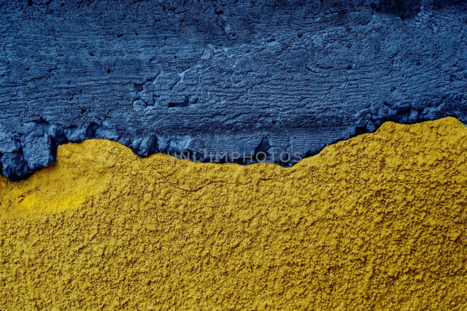 Ukrainian flag on textured wall. Putin invasion. War against Ukraine by Rabizo