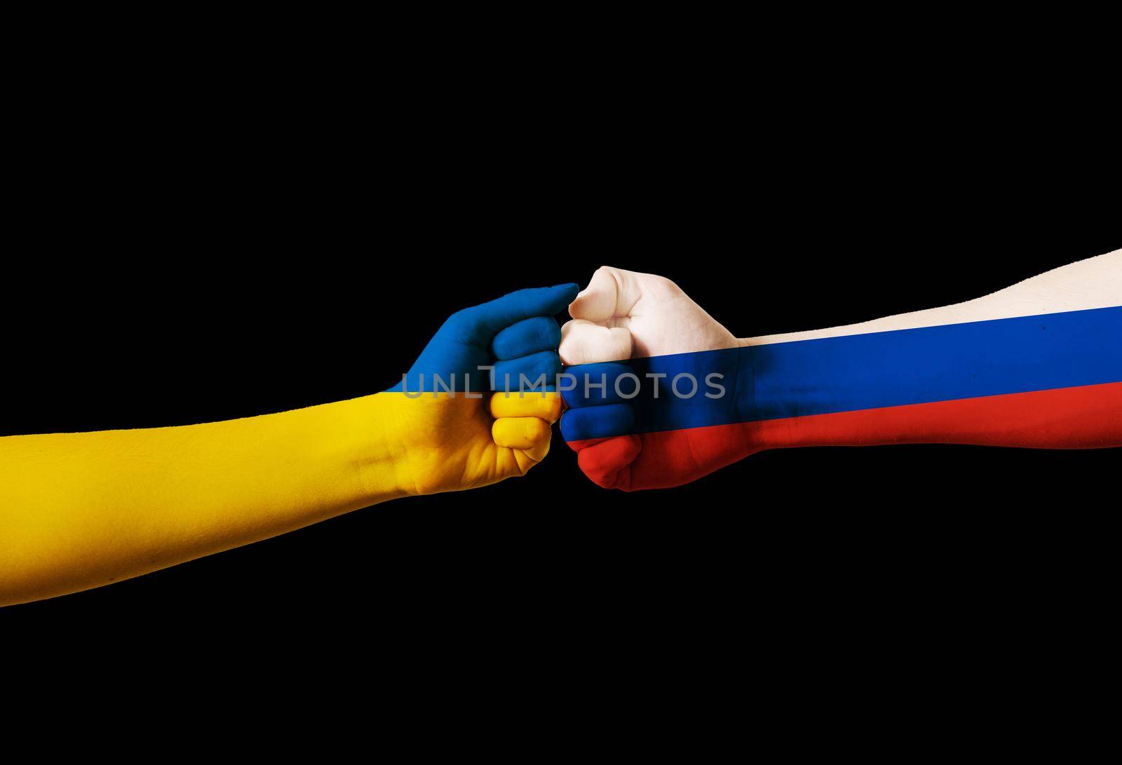 Fist fight flags of Ukraine and russia on black background. Stop war. Putin invasion. by Rabizo