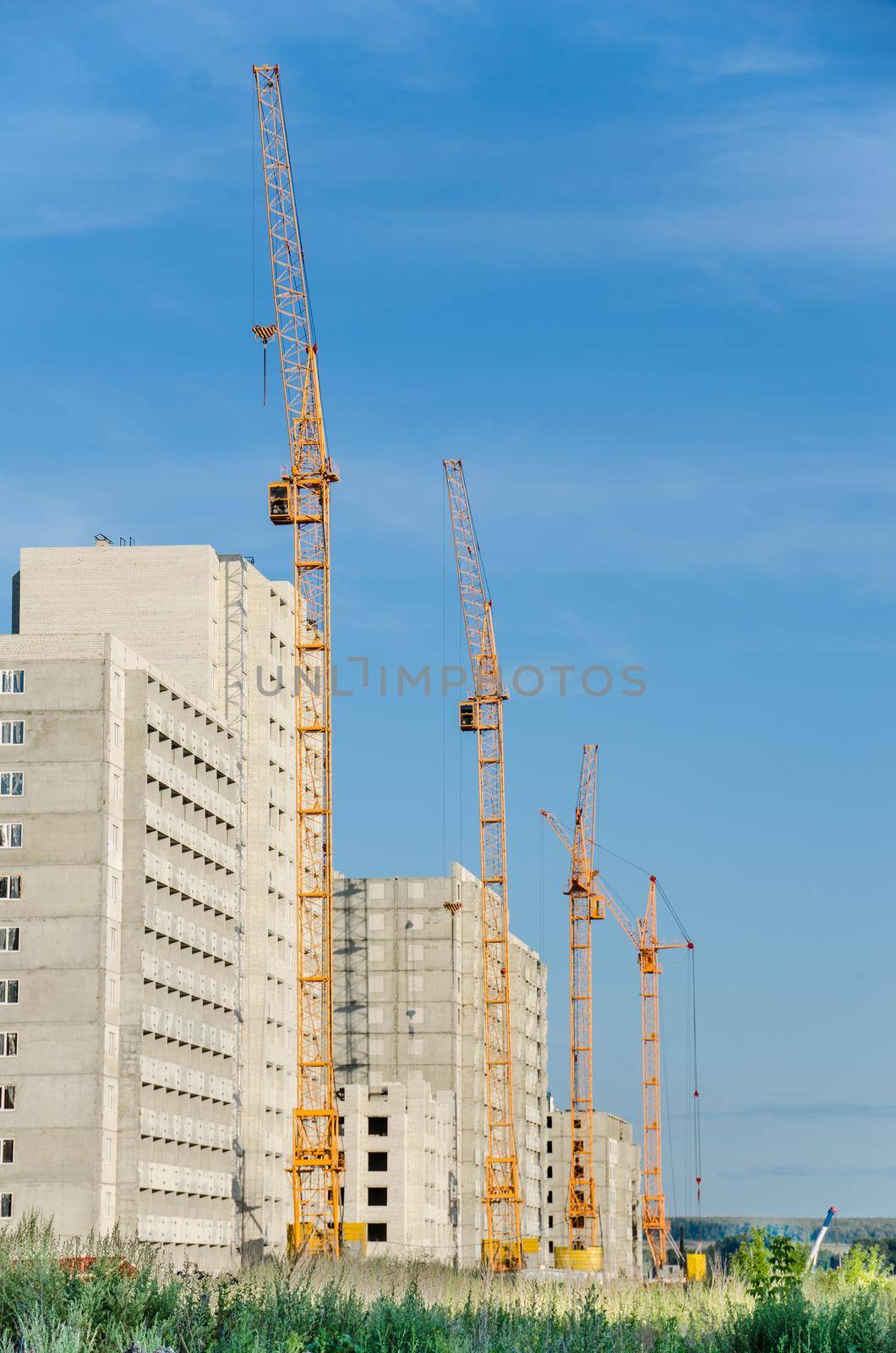 Construction site with cranes.