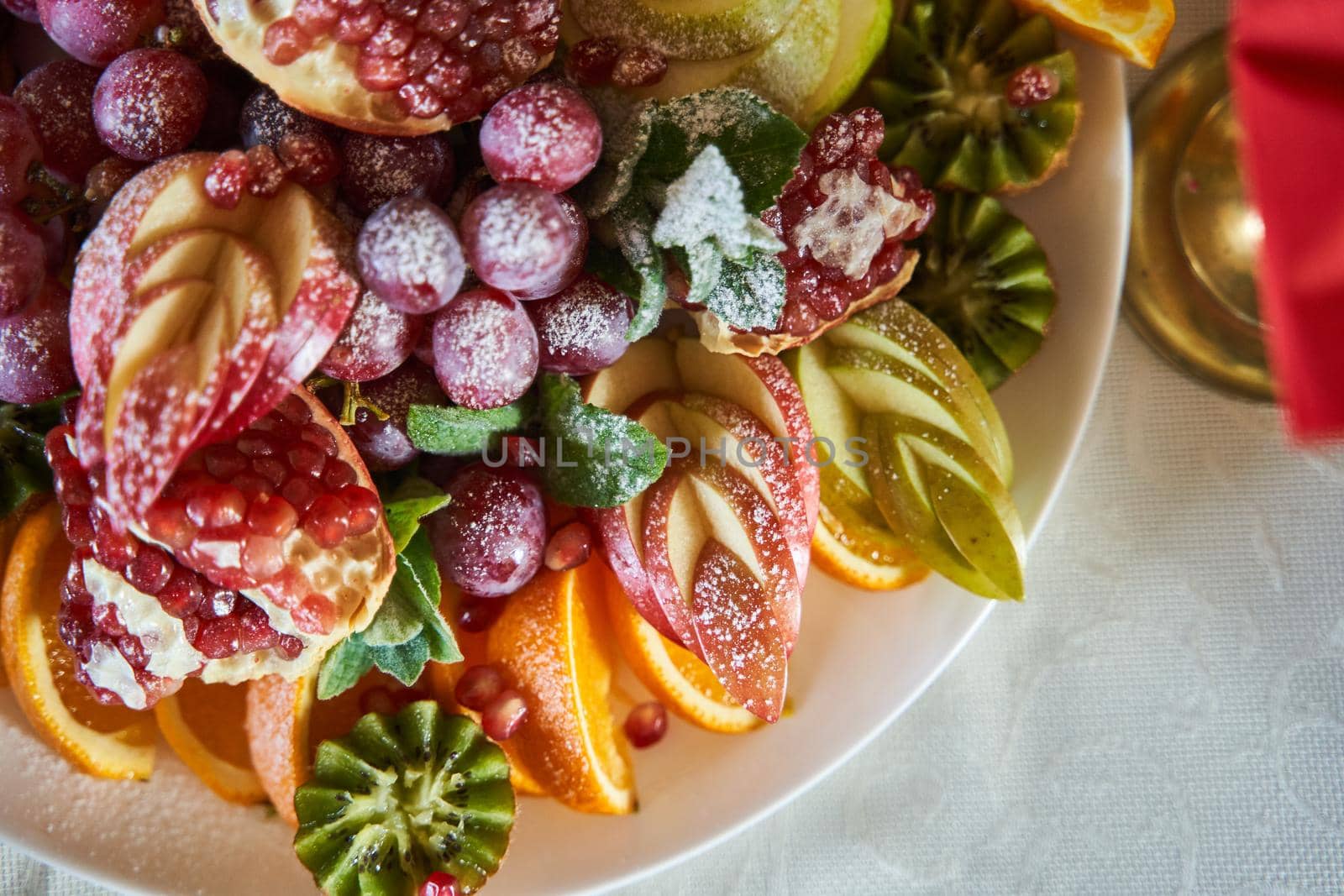 Fruit plate close-up. Healthy fruits. High-quality photo