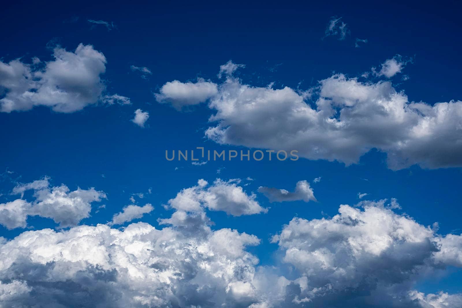 White and gray clouds in the blue sky background.