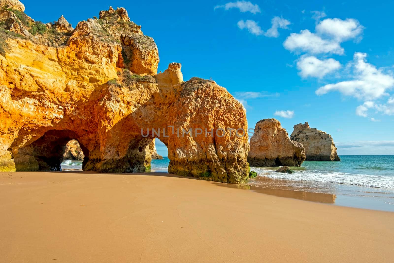 Natural rocks at Praia Tres Irmaos in Alvor the Algarve Portugal