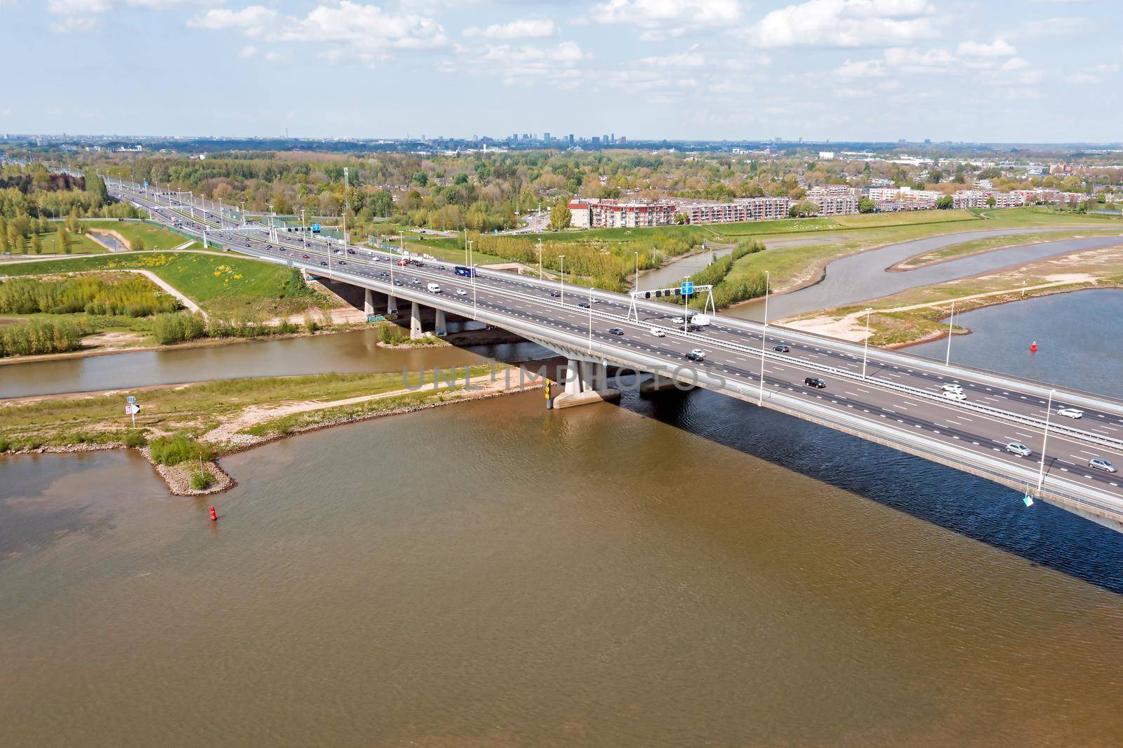 Aerial from bridge over the river Lek with the highway A2 near Utrecht in the Netherlands