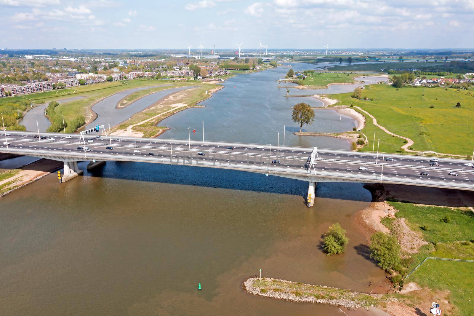 Aerial from bridge over the river Lek with the highway A2 near Utrecht in the Netherlands by devy