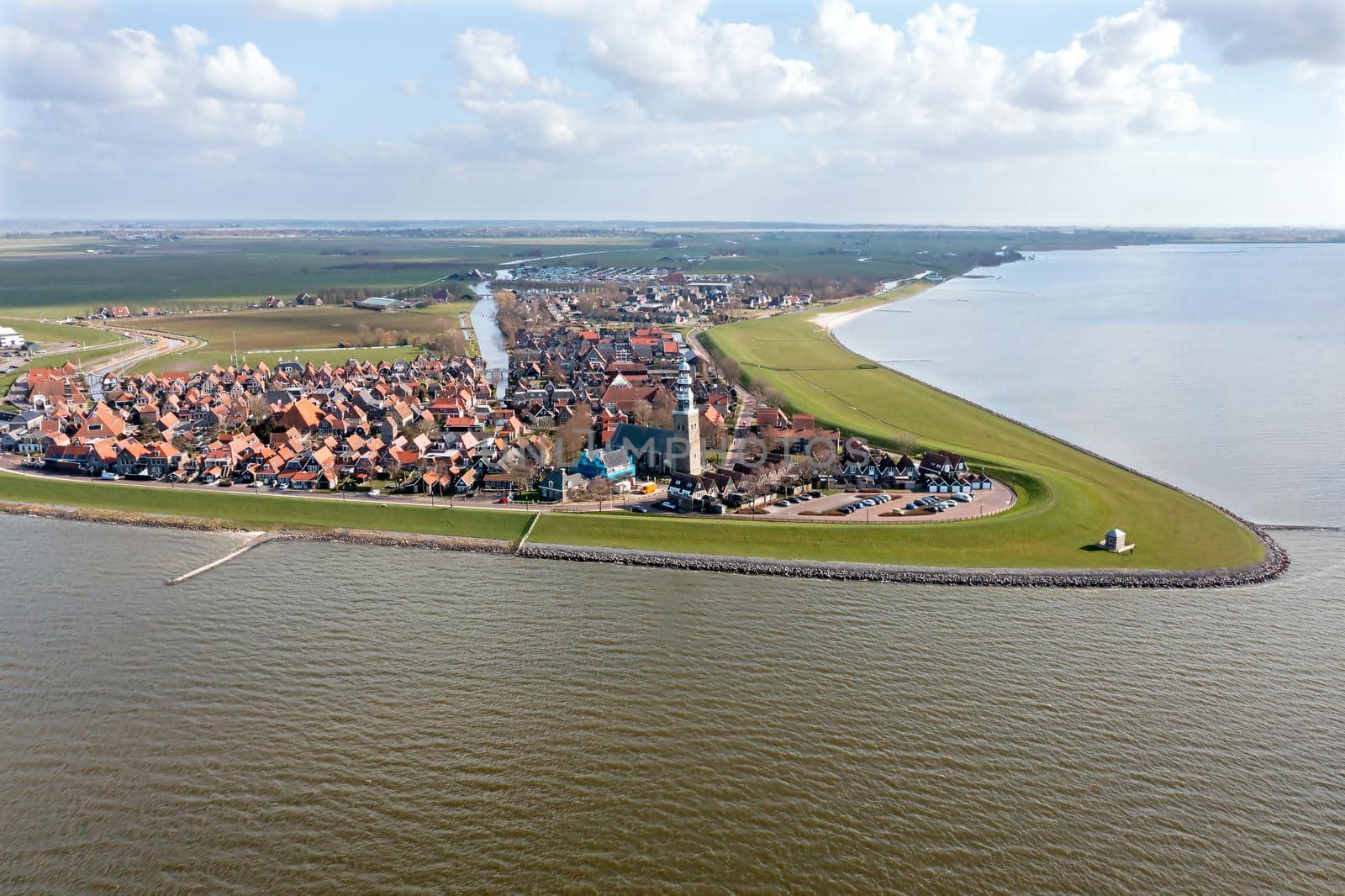 Aerial from the traditional village Hindeloopen at the IJsselmeer in the Netherlands by devy