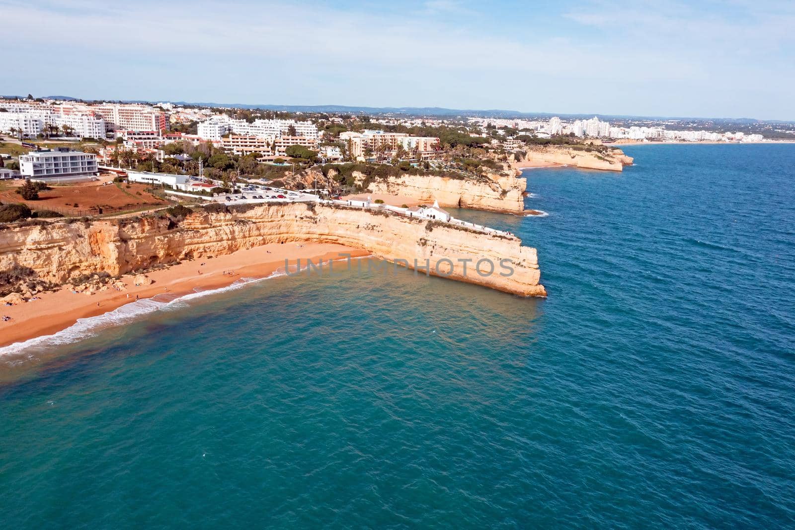 Aerial from the Algarve coastline at Church Senhora de Nossa in Armacao de Pera Portugal