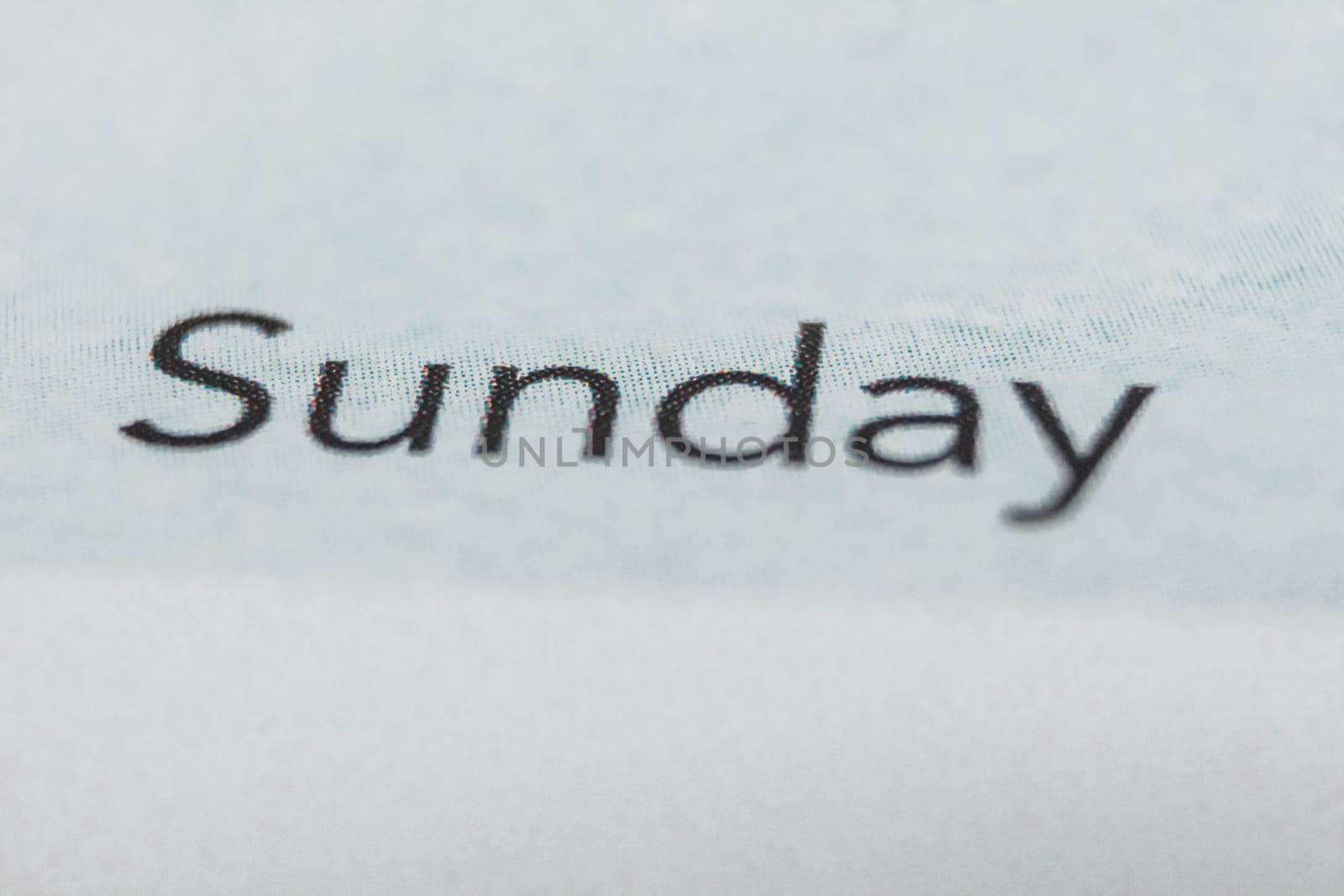 Sunday, days of the week. Black and white macro shot of monthly planner - Image by JuliaDorian