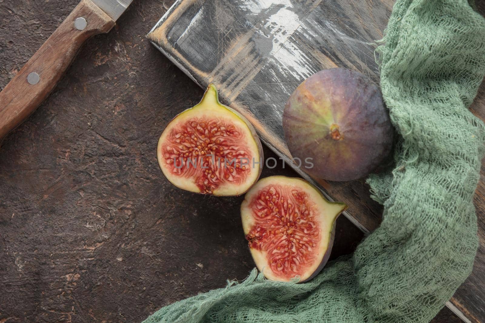 Ripe Figs on a dark table background