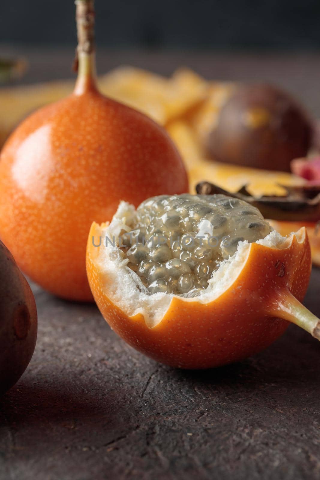 Tropical fruits on a dark background table
