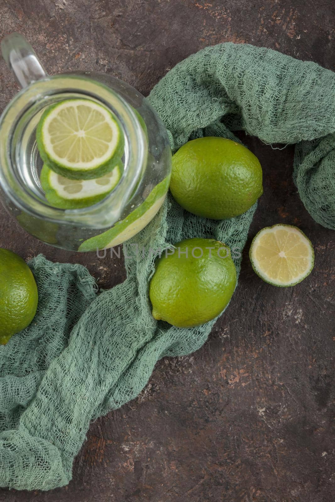Fresh green lime and lemonade top view