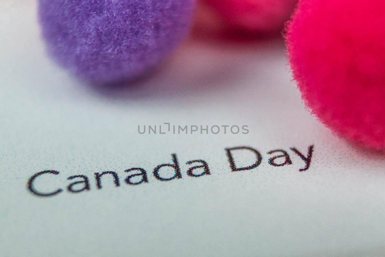 close up of a daily planner or calendar with a hand written message for a celebration or holiday like Canada day by JuliaDorian