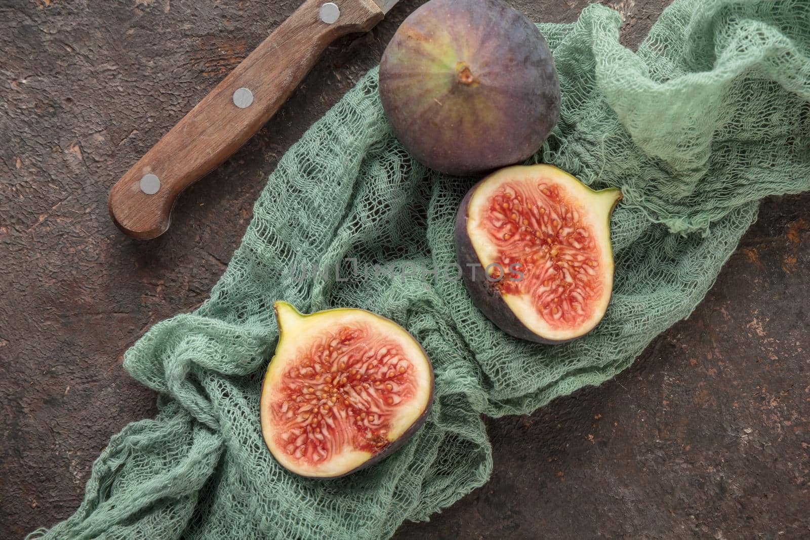 Ripe Figs on a dark table background