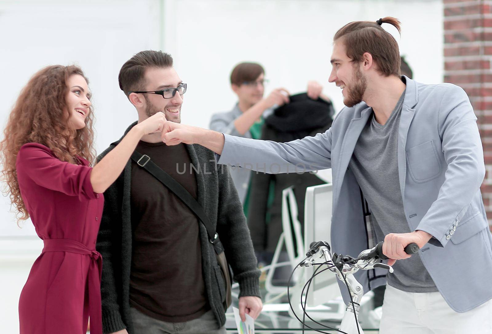 managers congratulate the customer with the purchase of the bike.