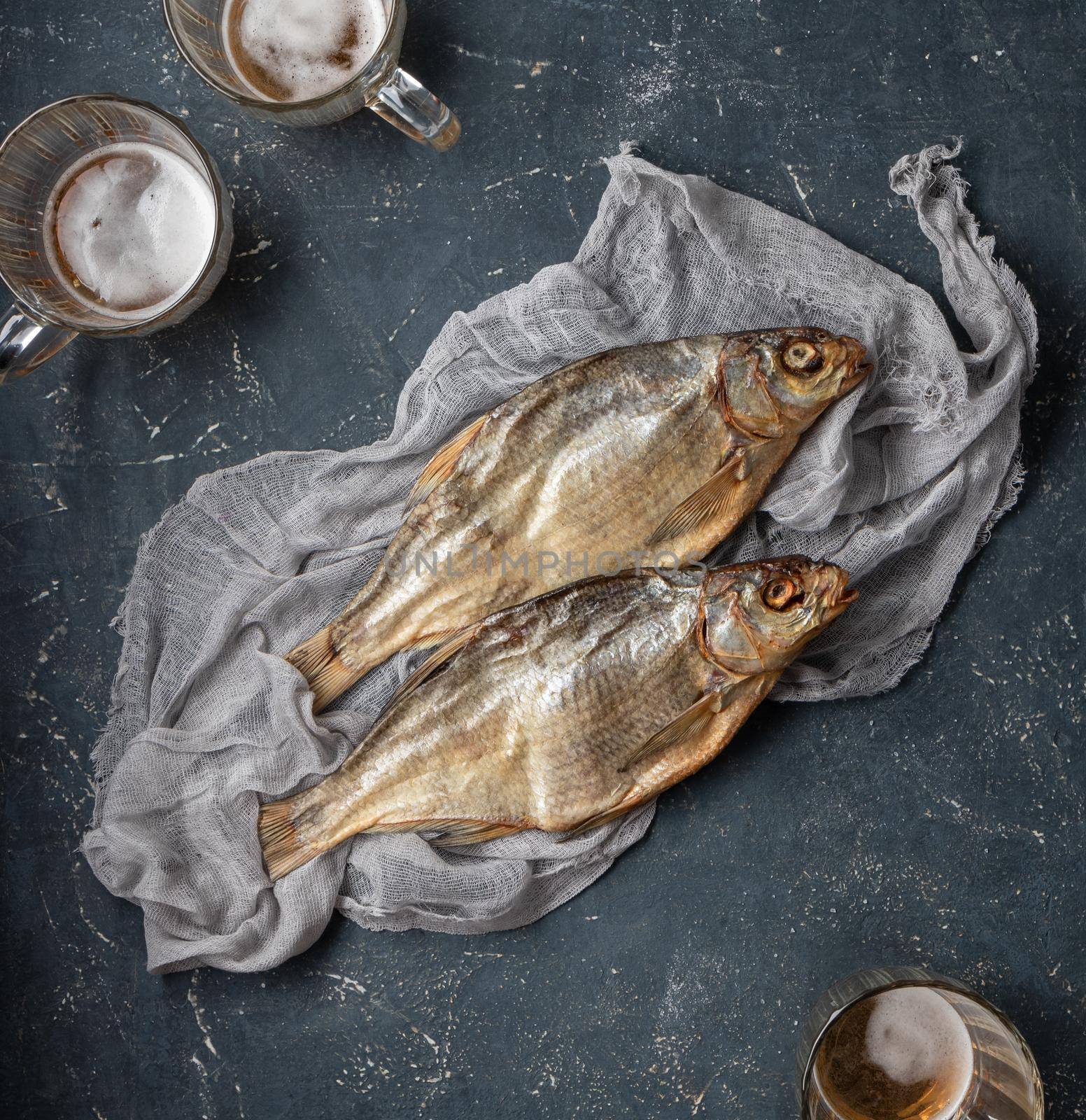 Dried caspian roach fish on a blue background