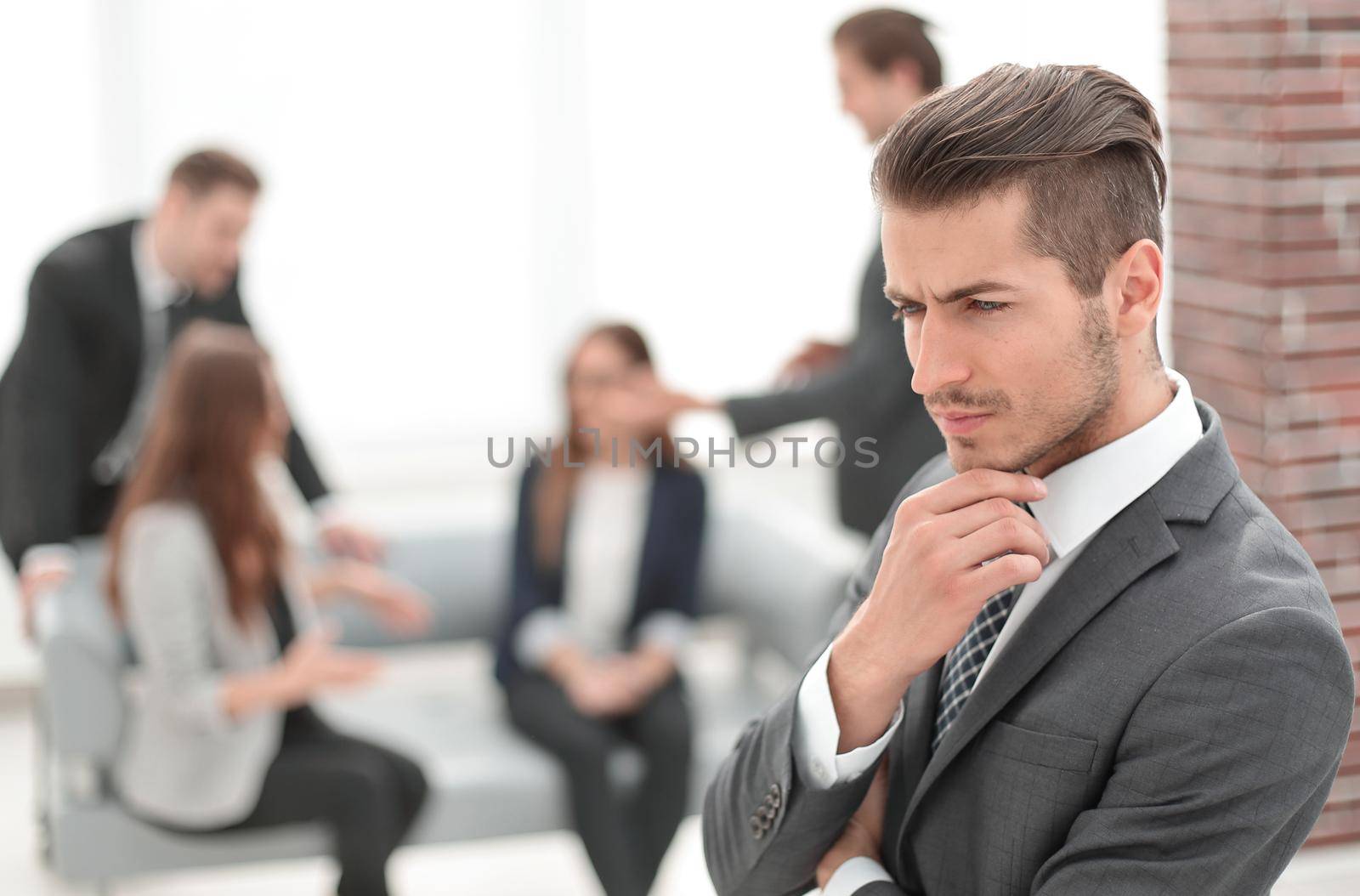 Young man in business suit smiling by asdf