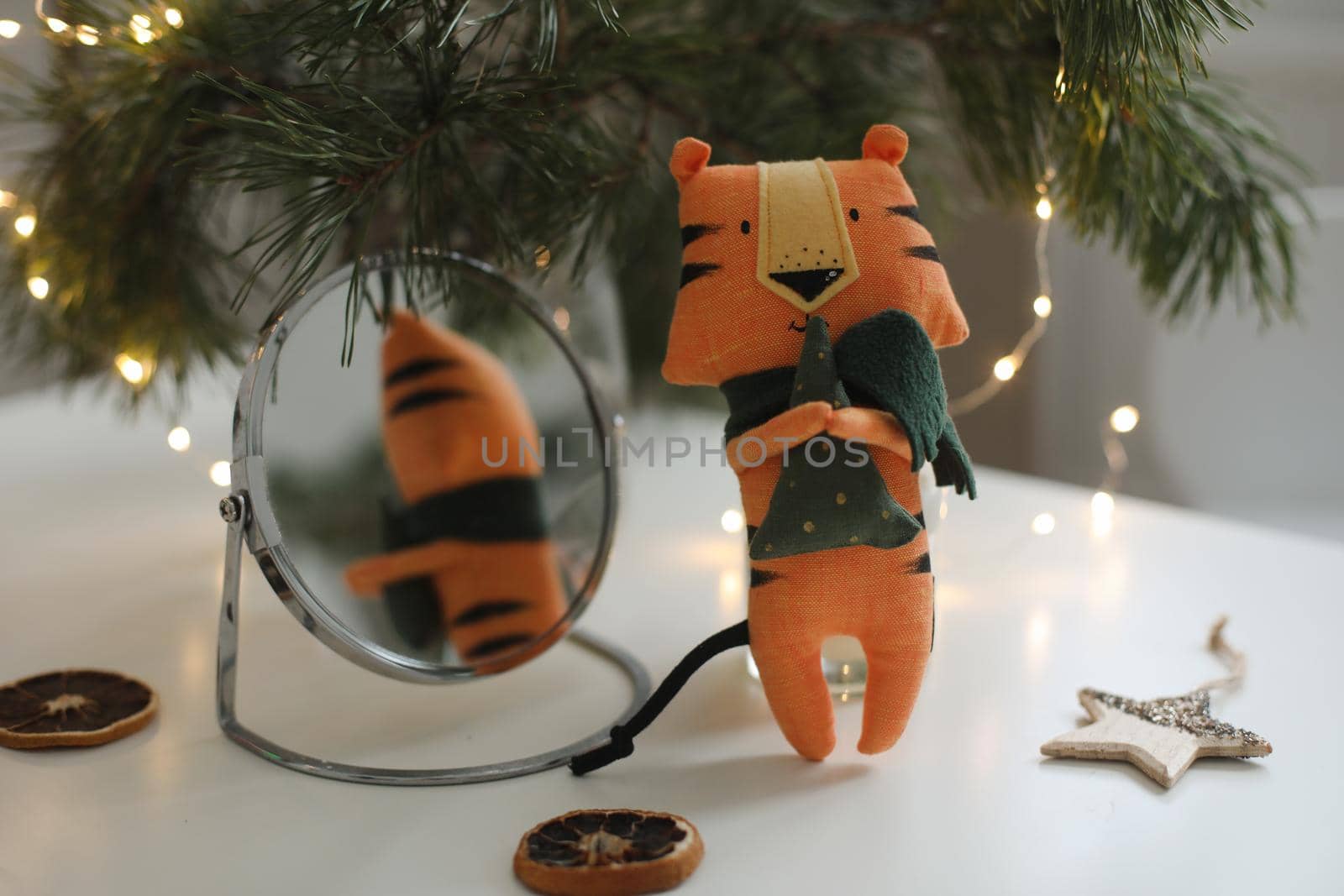 cute soft toy tiger - symbol of 2022, oriental calendar concept. High quality photo