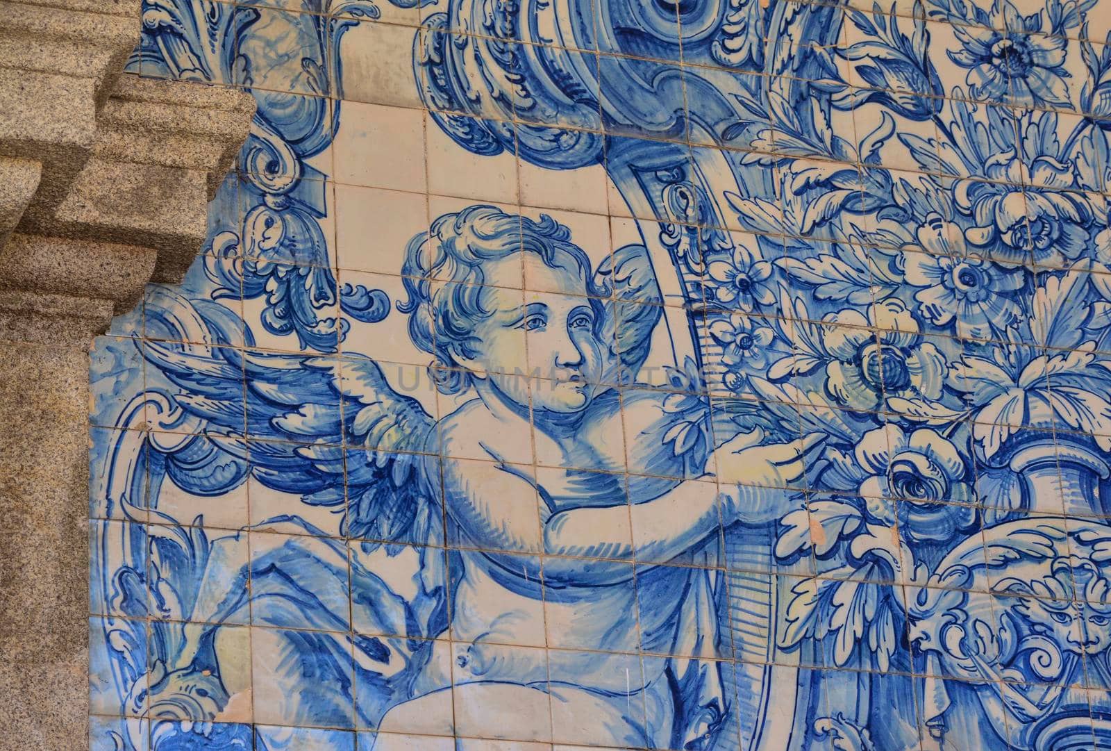 Typical old tiles of Portugal, detail of a classic ceramic tiles azulejo, art of Portugal