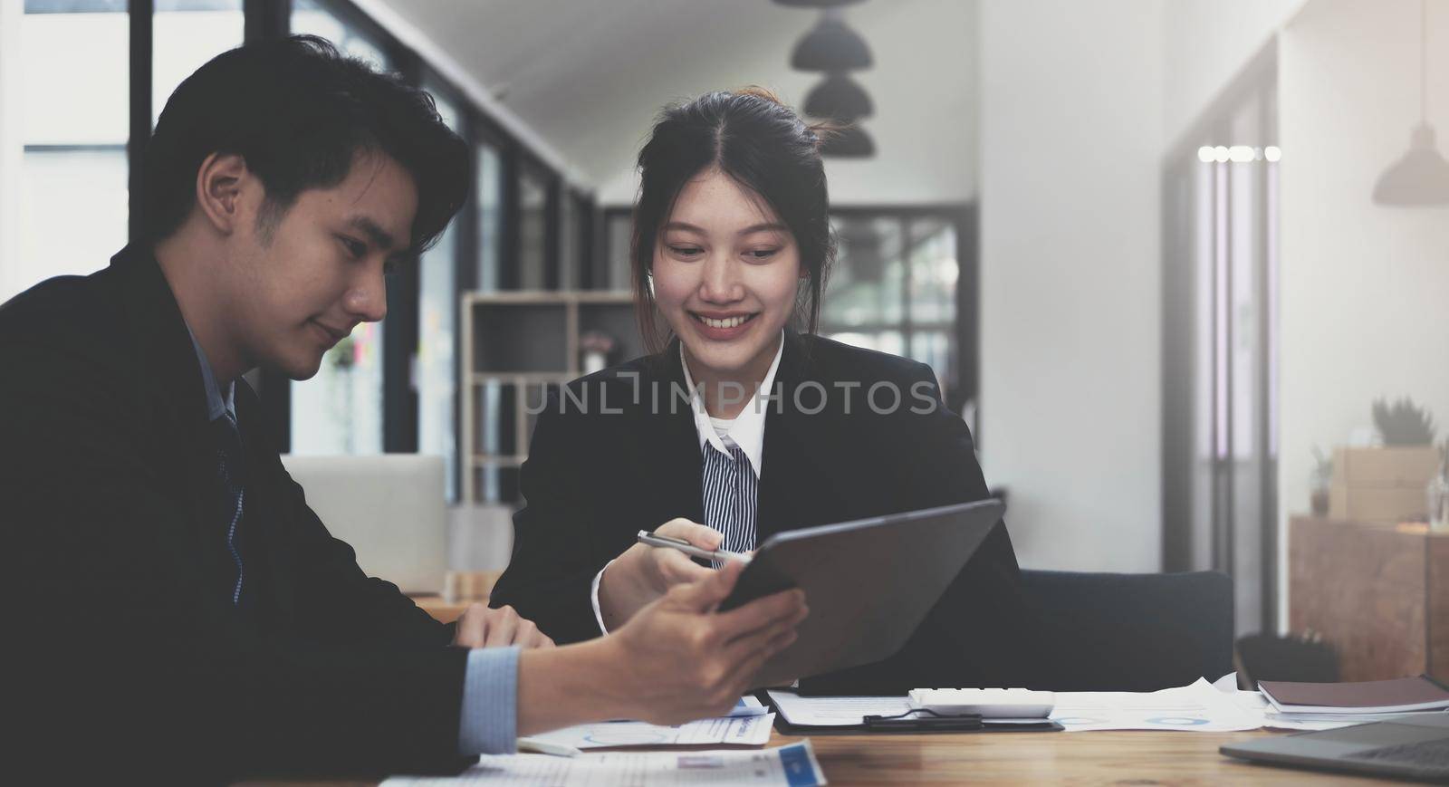 Office Conference Room Meeting: Portrait of Asian Female Manager Susscessfully Presents e-Commerce Investment Strategy for Group of Digital Entrepreneurs. by wichayada