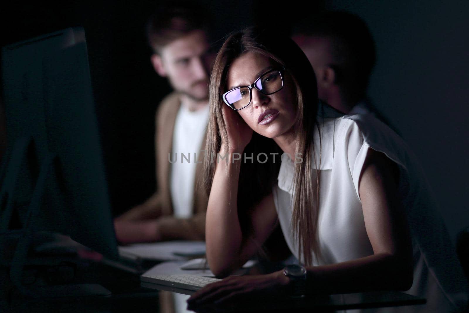 close up.portrait of a young business woman.photo on black background