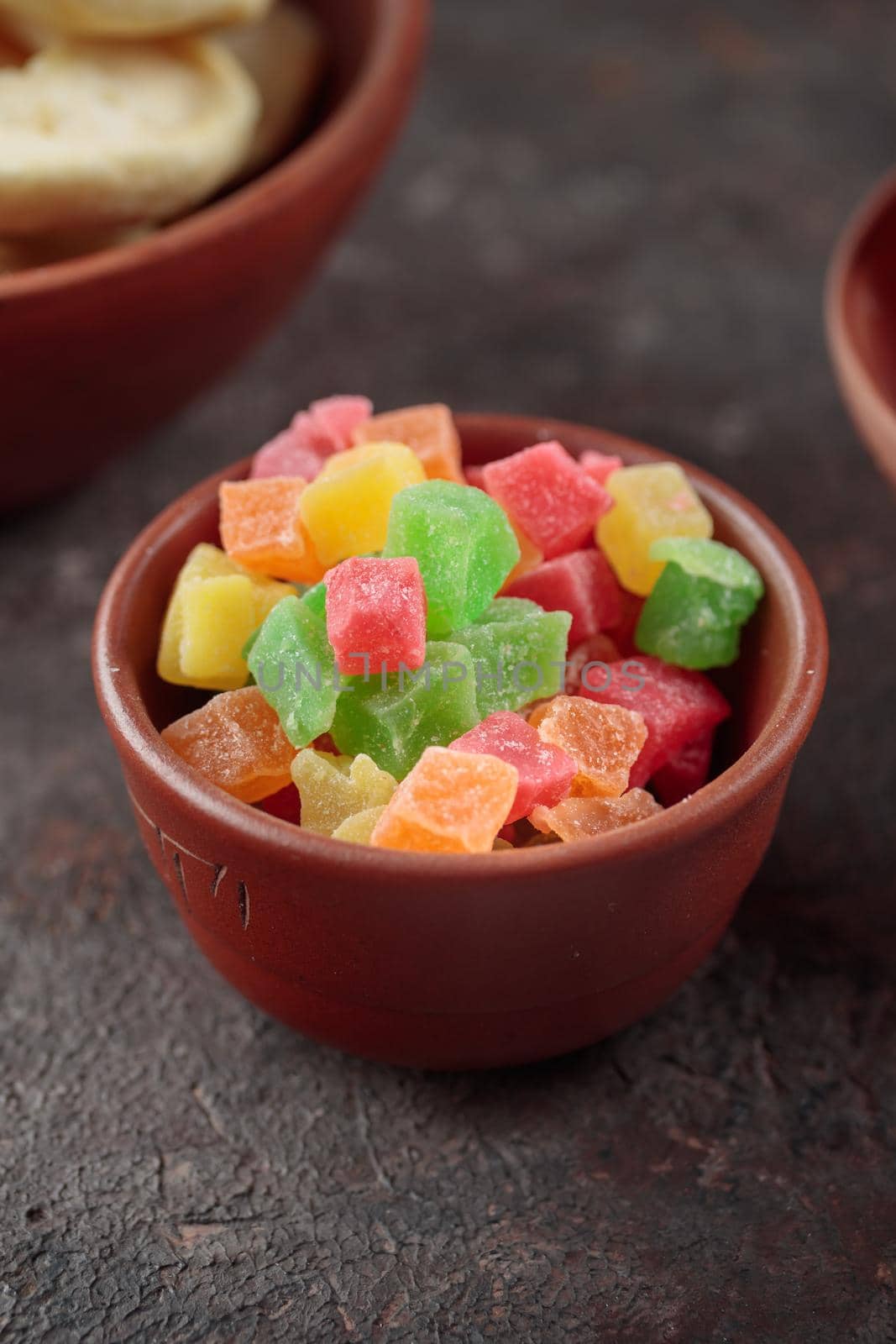 Dried Sweet Fruits on a dark brown background