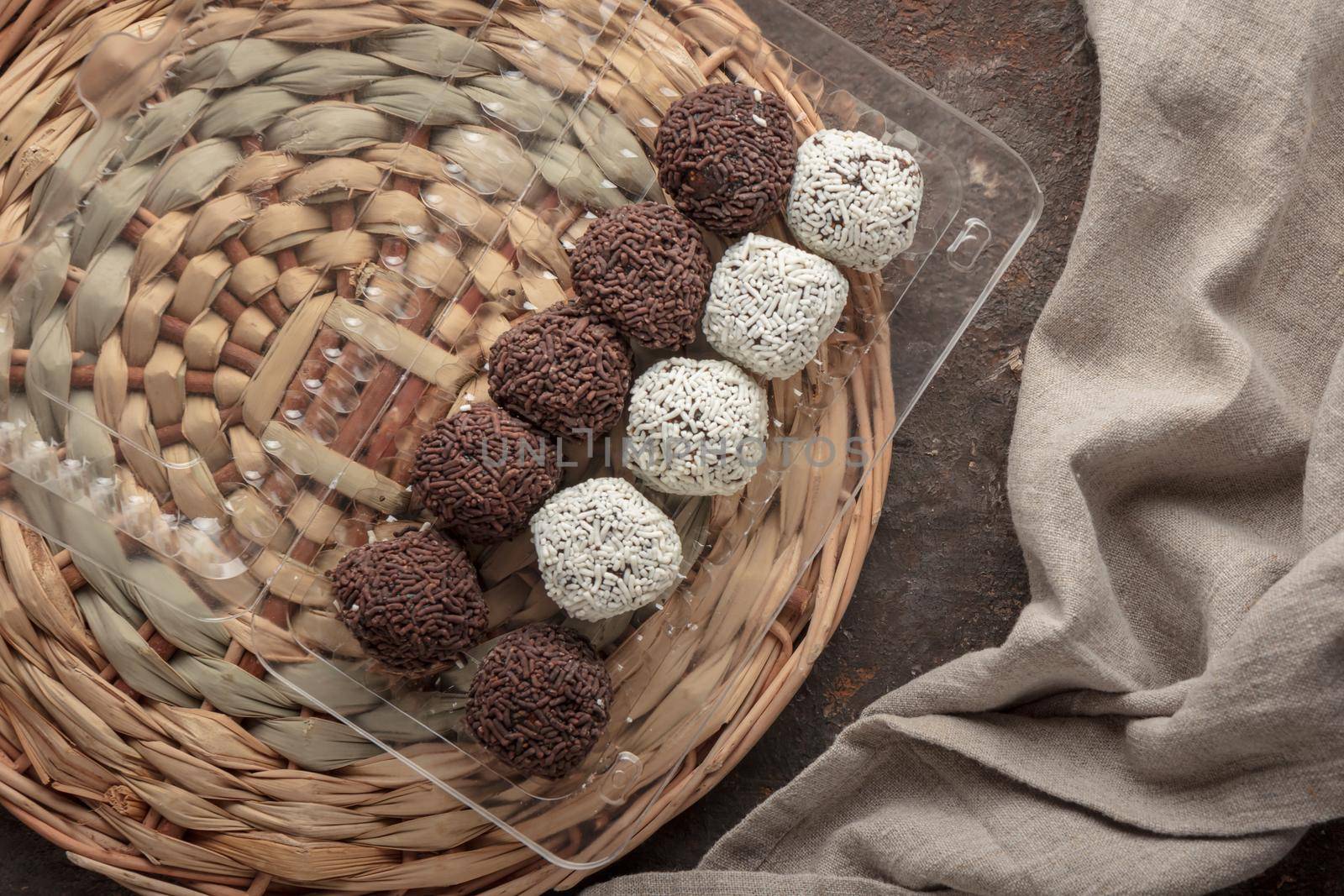 Raw chocolate homemade candies dark background