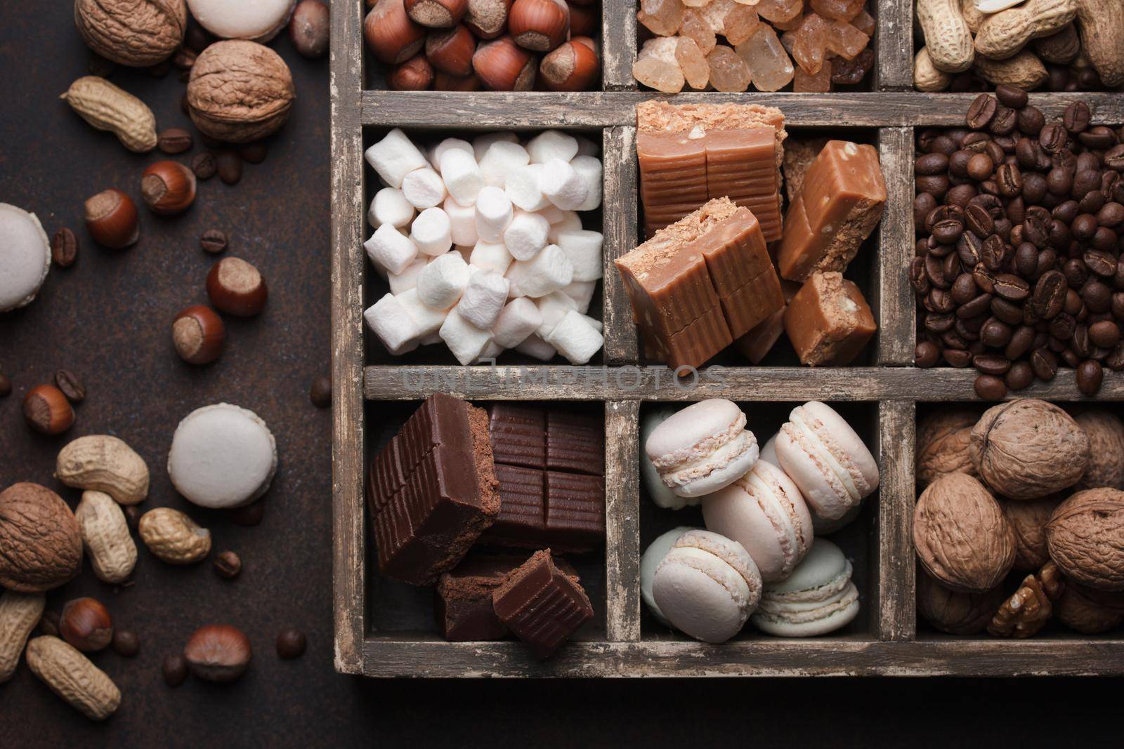 Assorted chocolate sweets in a dark box