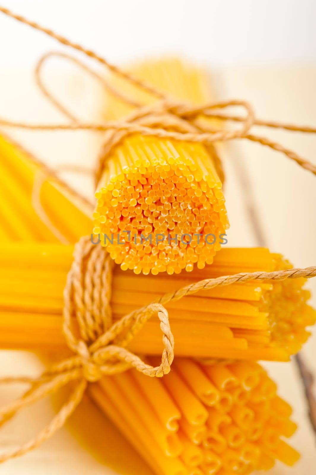 bunch of Italian pasta type on a white rustic table 