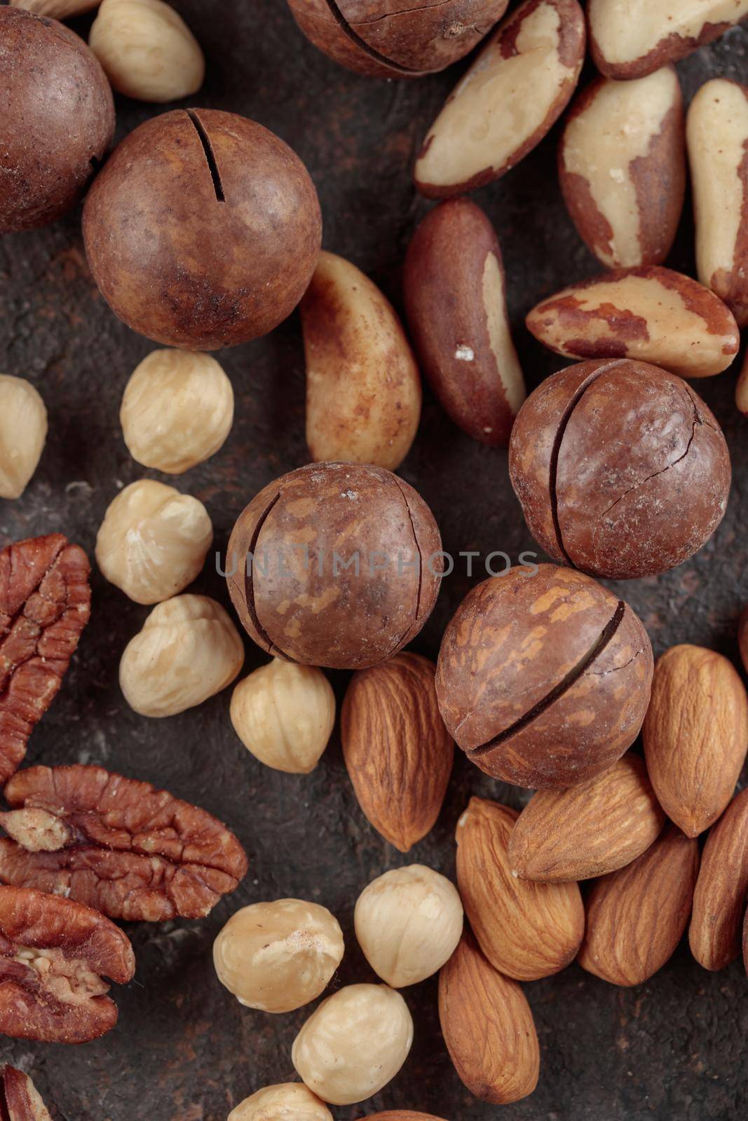 Assorted nuts macro on a dark background