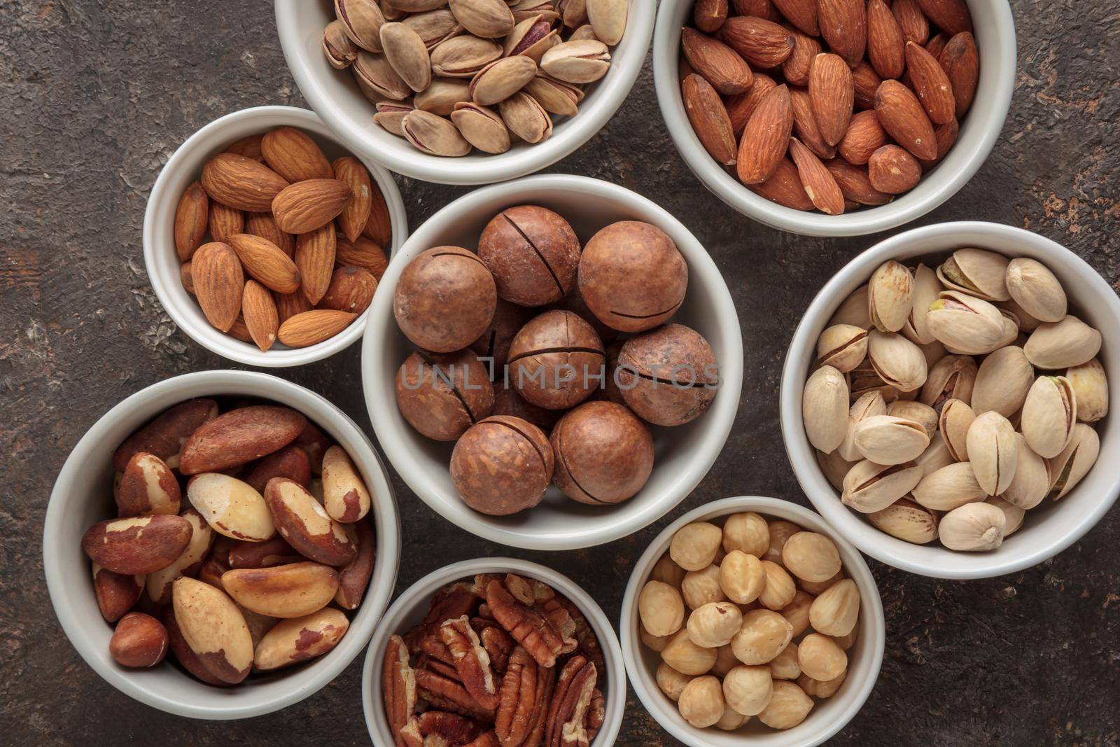 Assorted nuts macro on a dark background