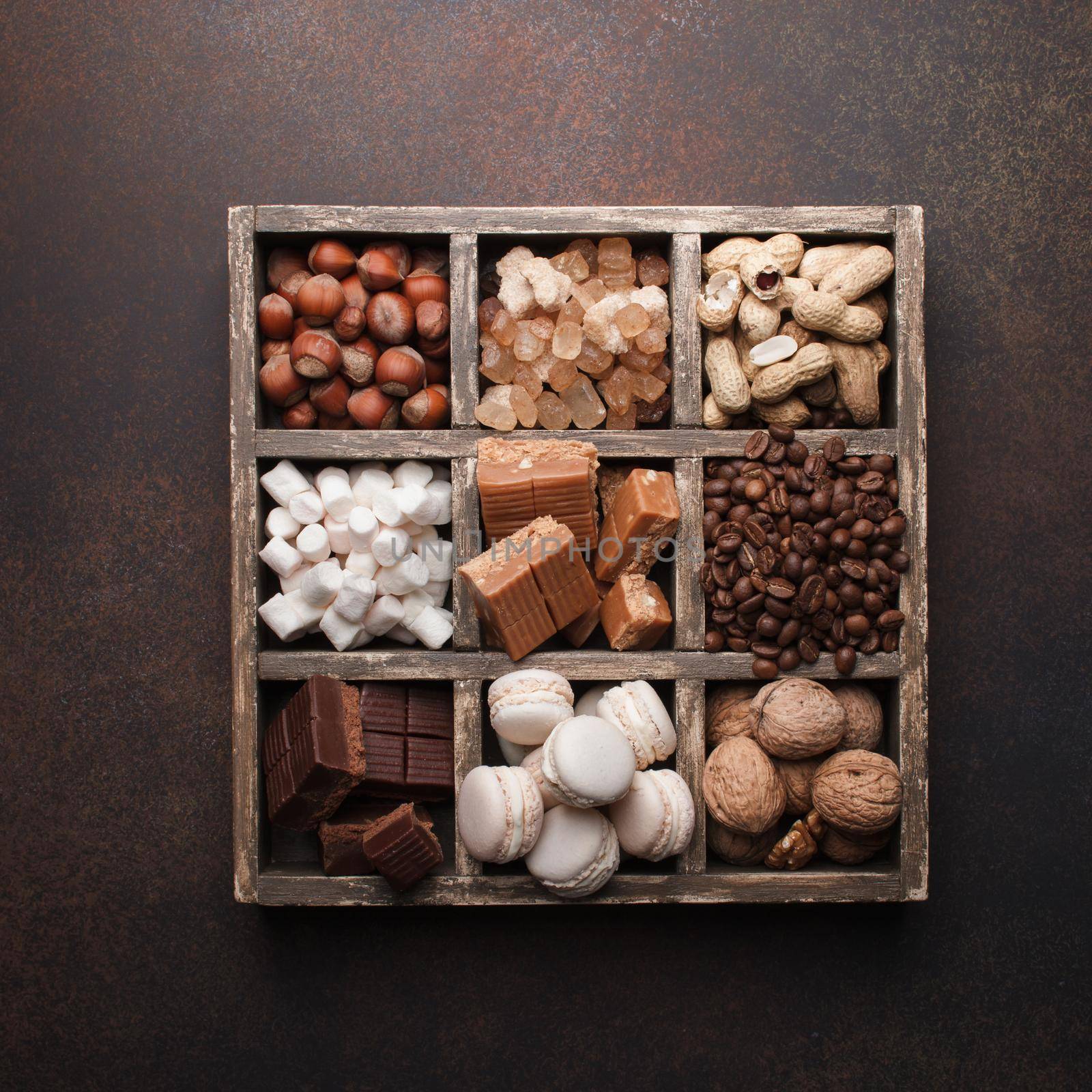 Assorted chocolate sweets in a dark box