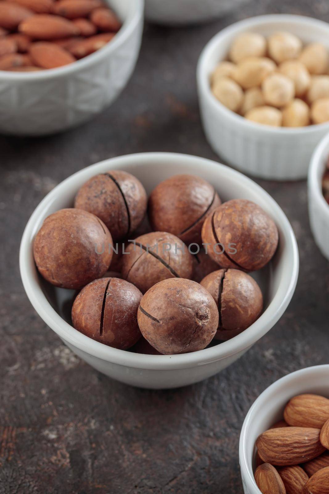 Assorted nuts macro on a dark background