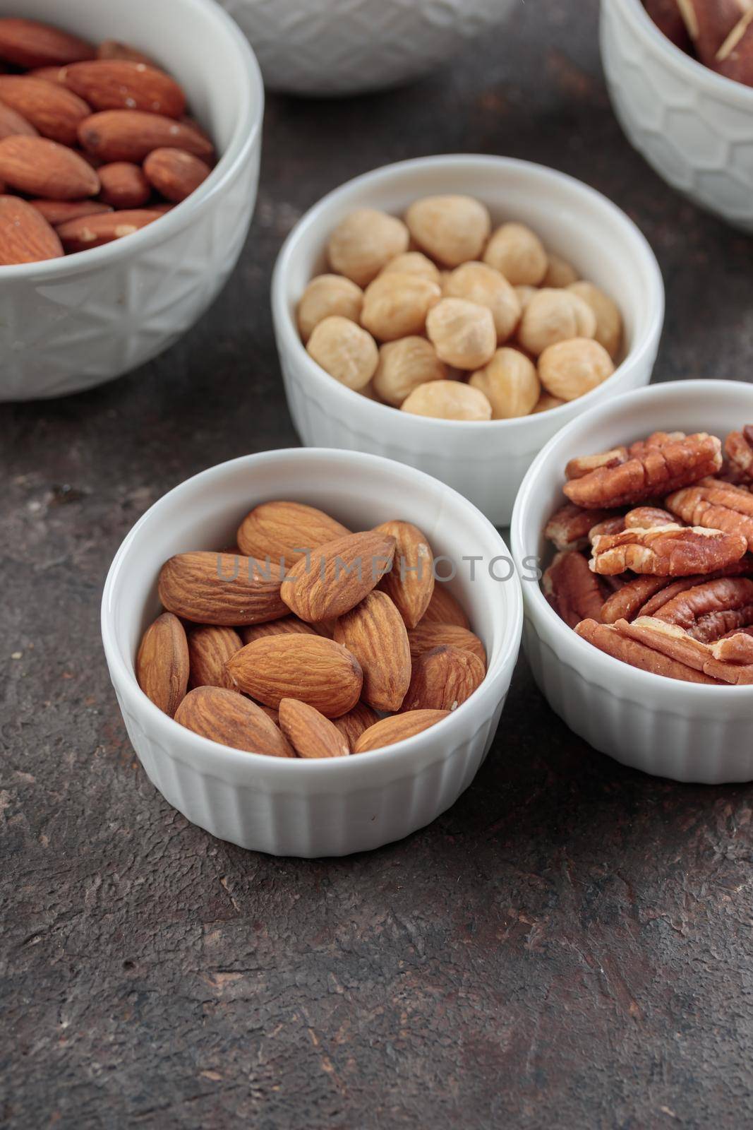 Assorted nuts macro on a dark background