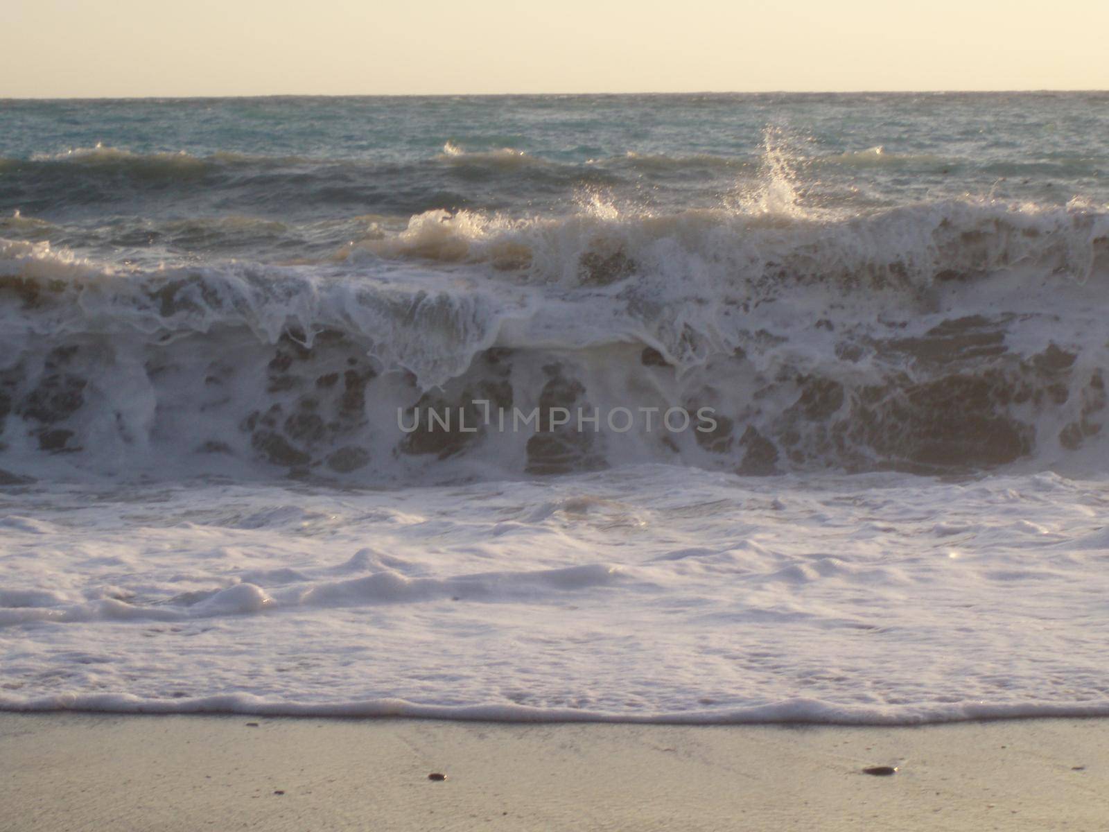 Storm at sea, storm warning on the coast. Big sea waves during a storm.