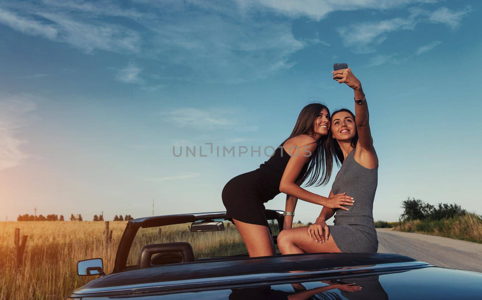 Beautiful two girls are photographed on the road by Standret