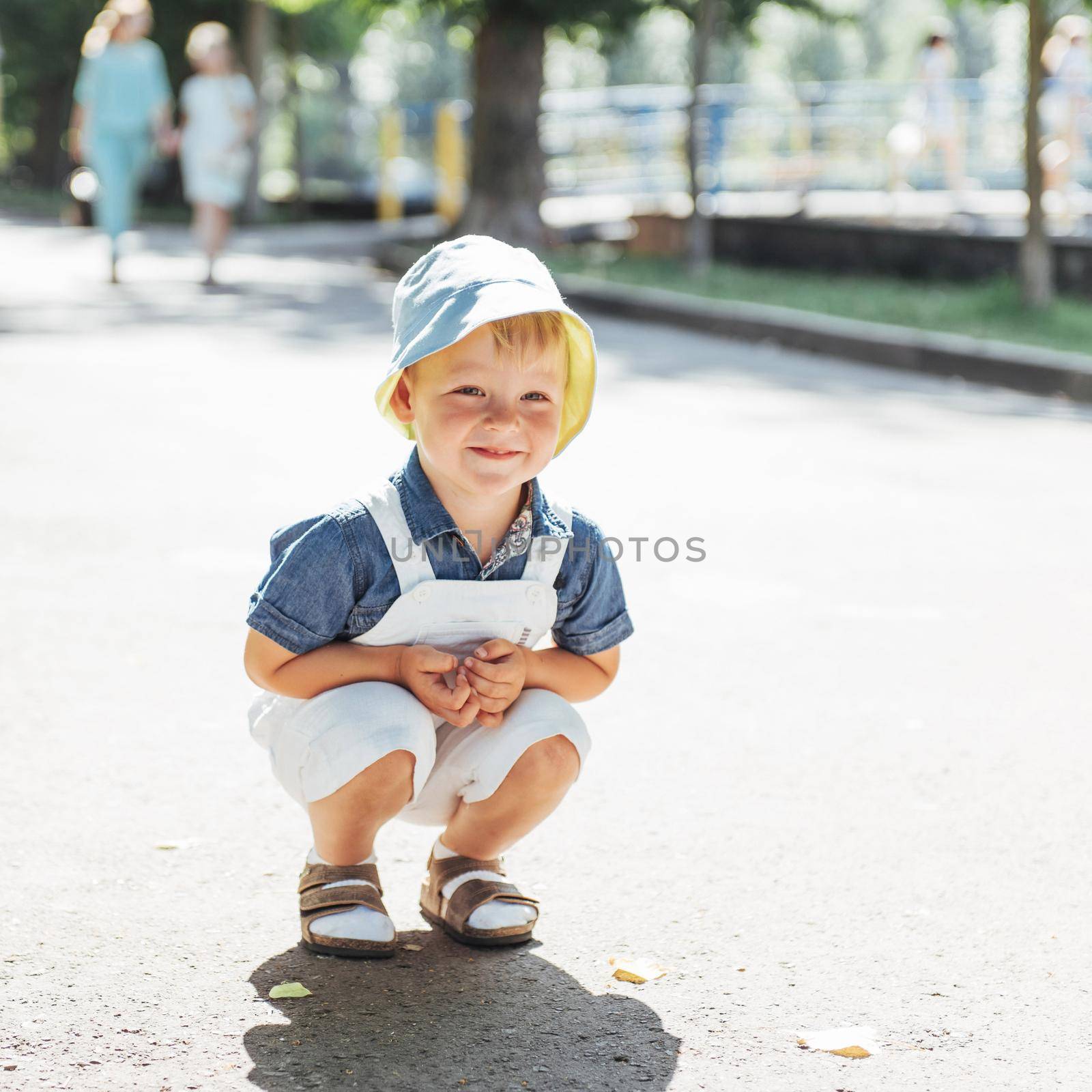 Cute boy posing for photo outdoors. Ukraine. Europe