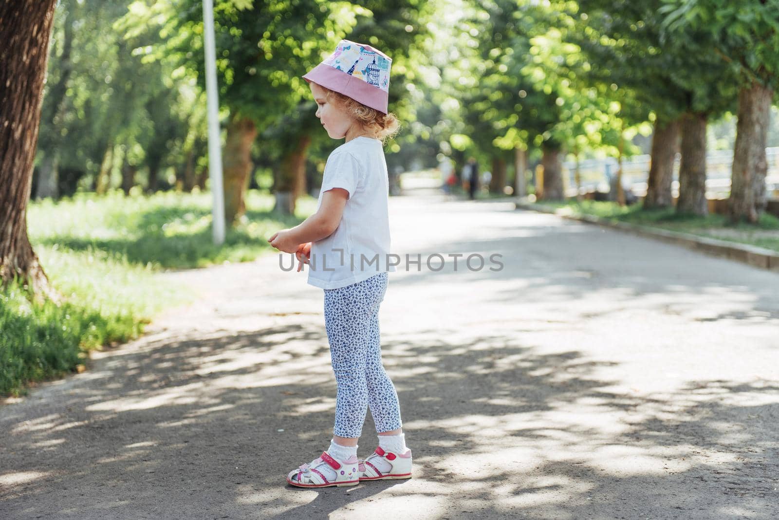 Beautiful girl in a summer sunny day.