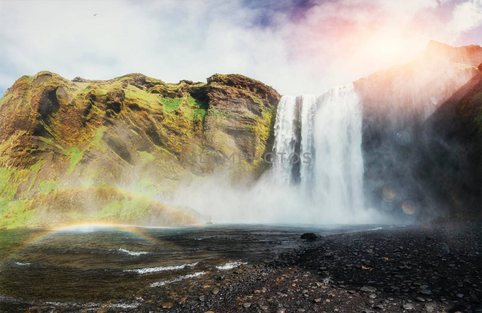 Great waterfall Skogafoss in south of Iceland near the town of Skogar. Colorful rainbow color.