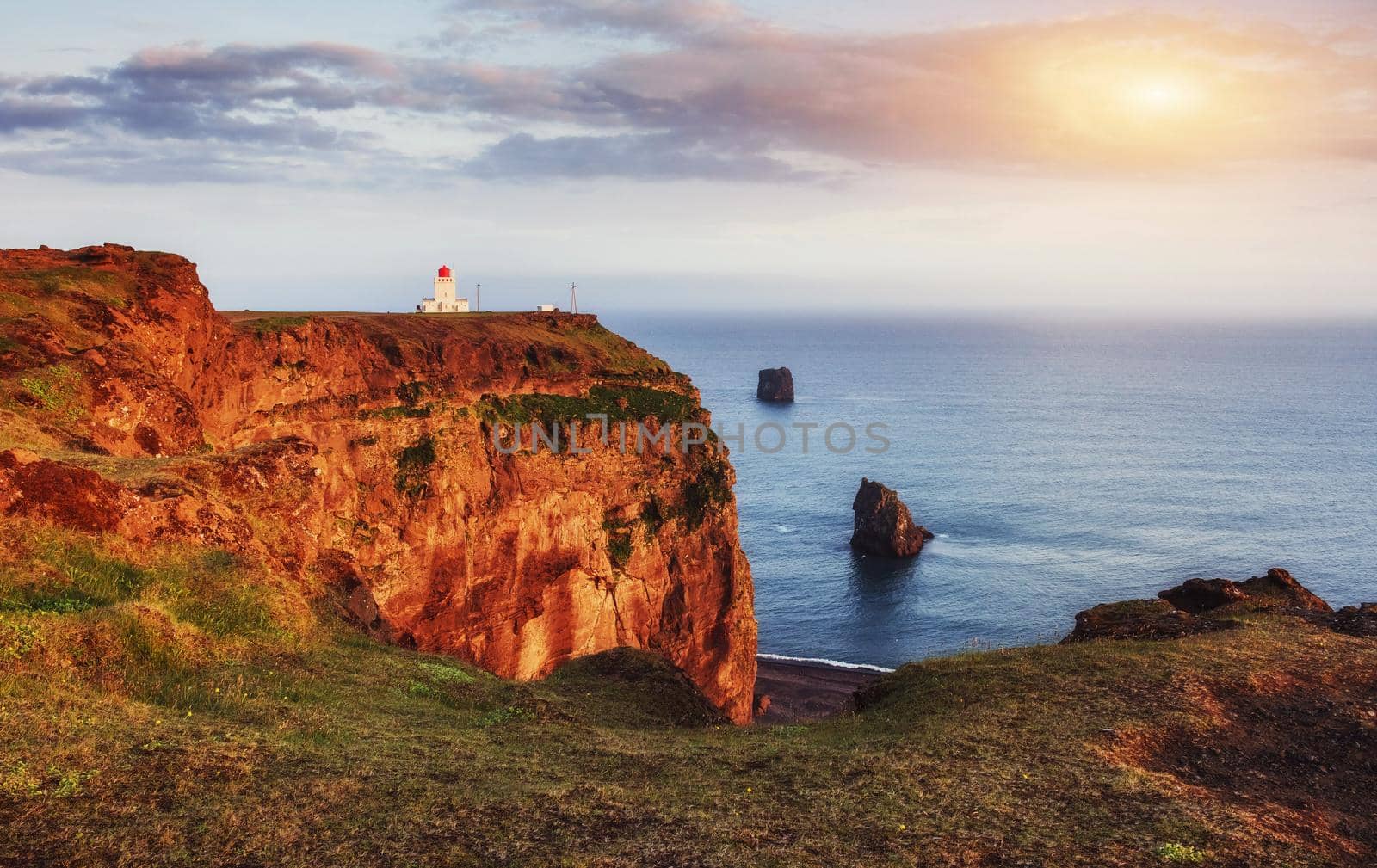 Beautiful white lighthouse at Cape Dyrholaey, South Iceland.